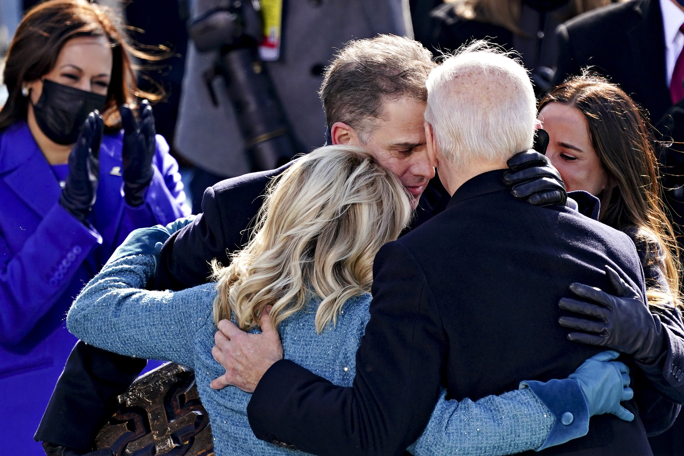 President Joe Biden hugs his family after being sworn in.