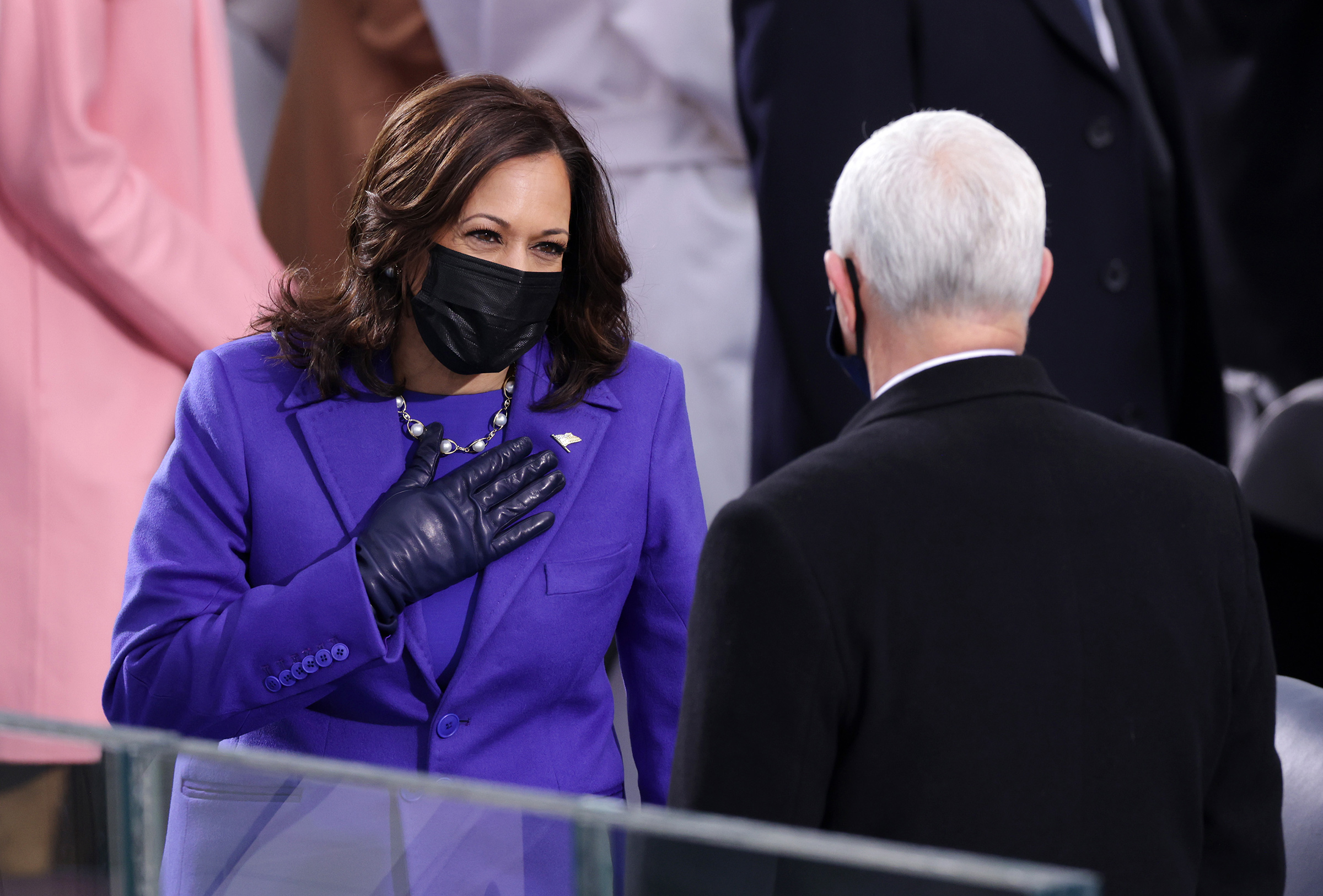 Vice President-elect Kamala Harris greets Vice President Mike Pence as she arrives to the inauguration on the West Front of the U.S. Capitol.