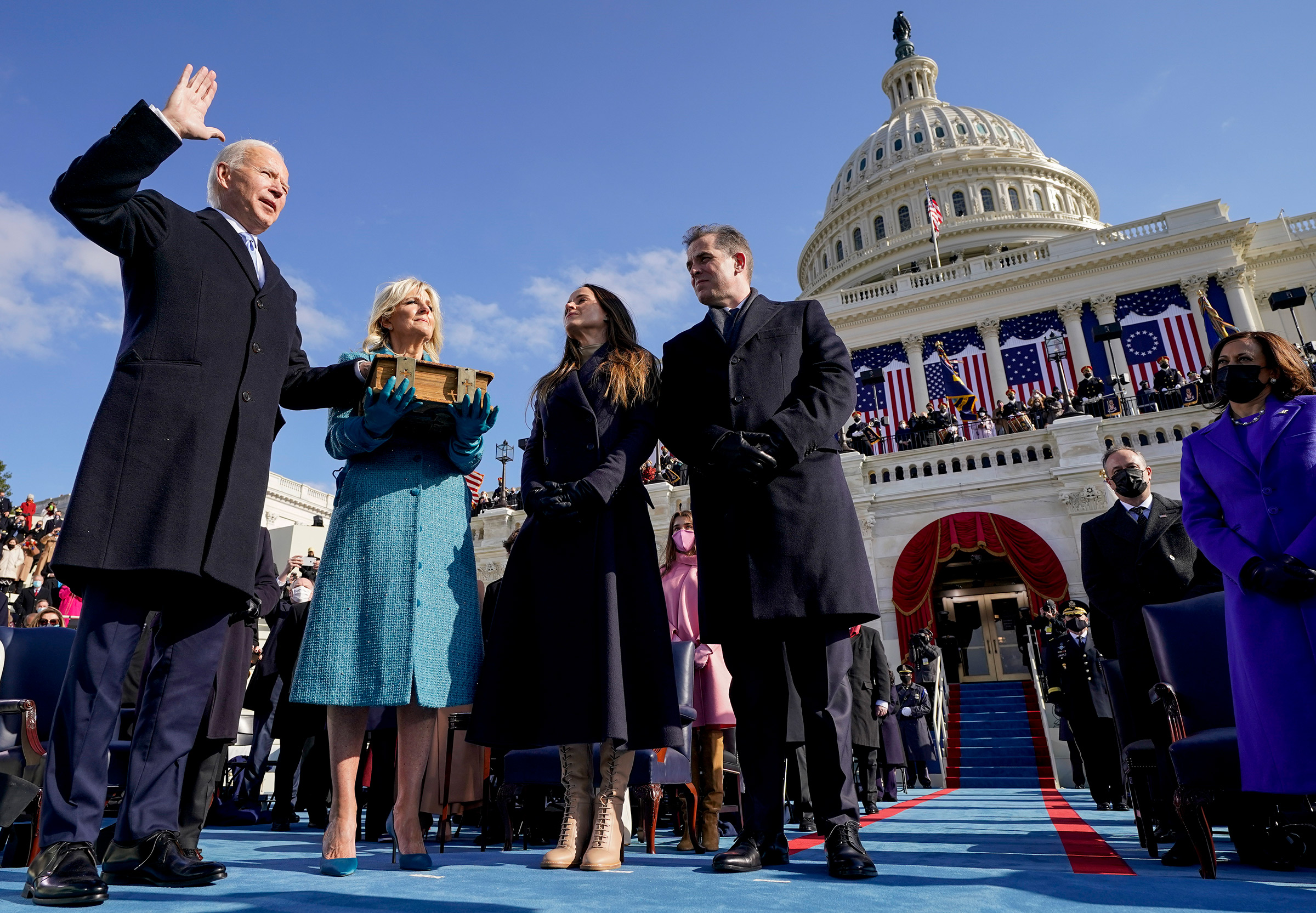 Joe Biden is sworn in as the 46th president of the United States by Chief Justice John Roberts as Jill Biden holds the Bible. (Andrew Harnik—Pool/AP)