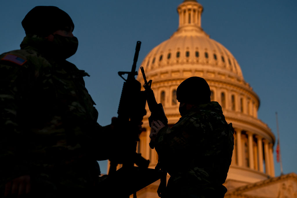 Weapons are distributed to members of the National Guard outside the U.S. Capitol on January 13, 2021 in Washington, DC. Security has been increased throughout Washington following the breach of the U.S. Capitol last Wednesday, and leading up to the Presidential inauguration. (Stefani Reynolds—Getty Images)