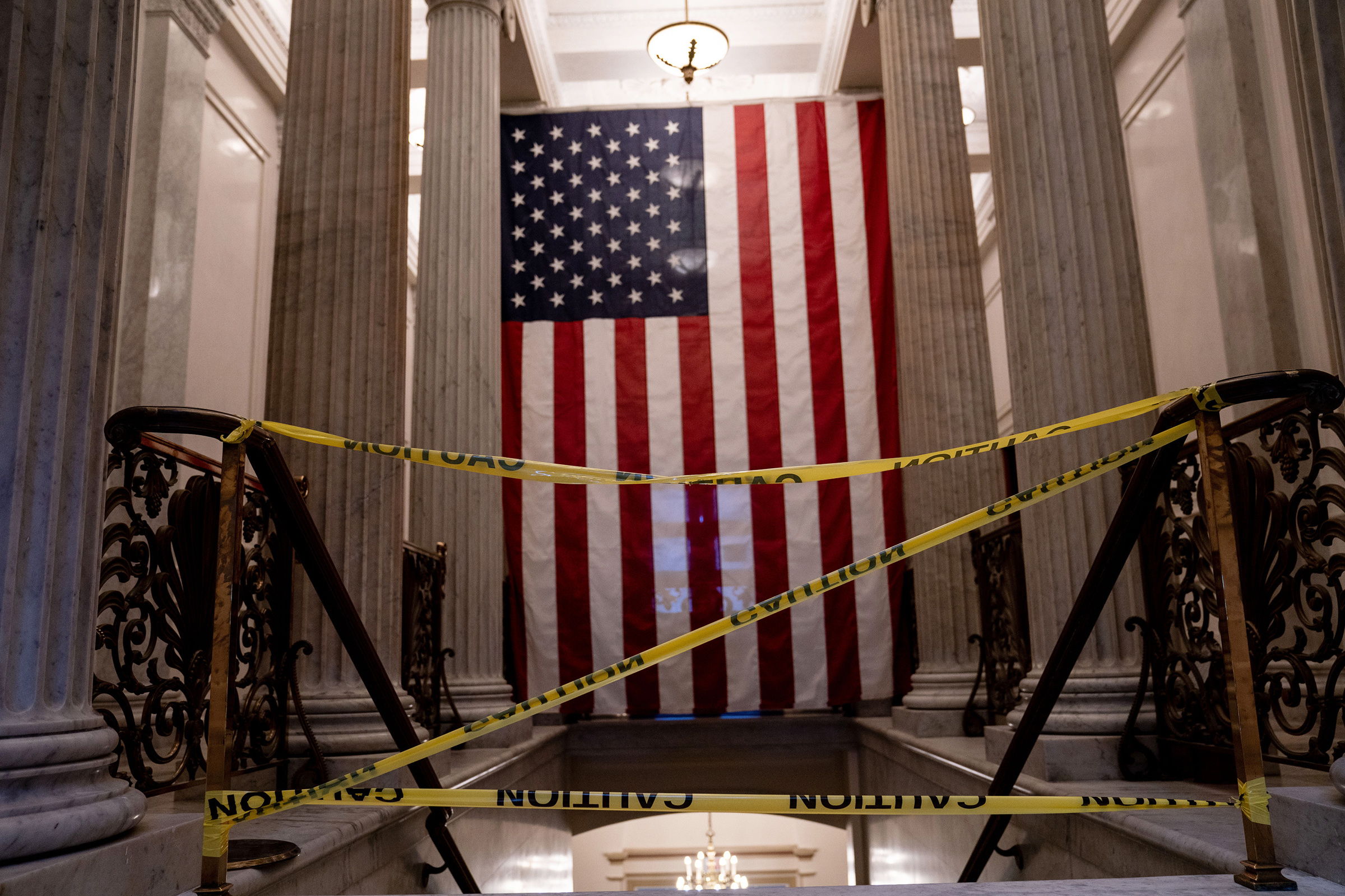Caution tape blocks a stairwell inside the Capitol in Washington on Jan. 9 (Anna Moneymaker—The New York Times/Redux)