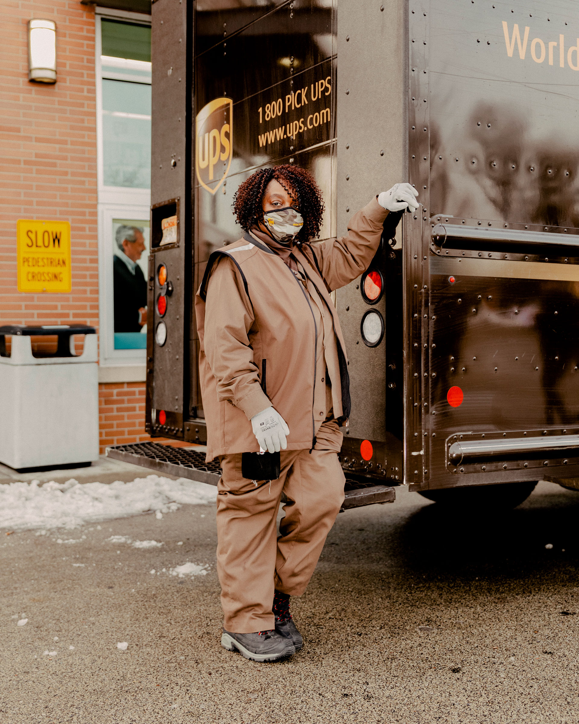 “I never thought I’d be part of a historic project like this,” says UPS driver Regina Vaughan after delivering her first box of COVID-19 vaccines to a Chicago-area Walgreens on Jan. 6 (Evan Jenkins for TIME)