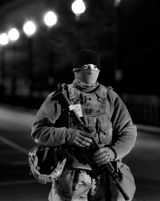 A member of the National Guard stands sentry outside the Capitol
