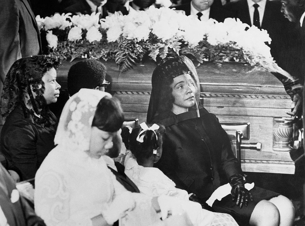 Coretta Scott King and Her Daughters near Coffin During Funeral