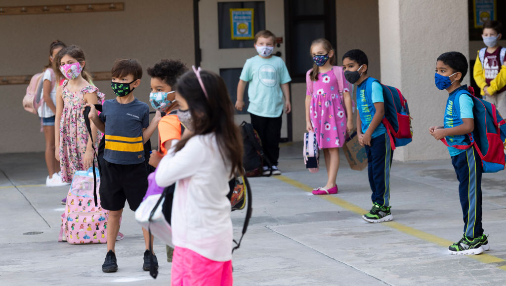 Students keep their distance and wear masks during the first day of in-person classes at an elementary school in Rancho Santa Margarita, Calif. on Sept. 29, 2020. (Paul Bersebach—MediaNews Group/ Getty Images)