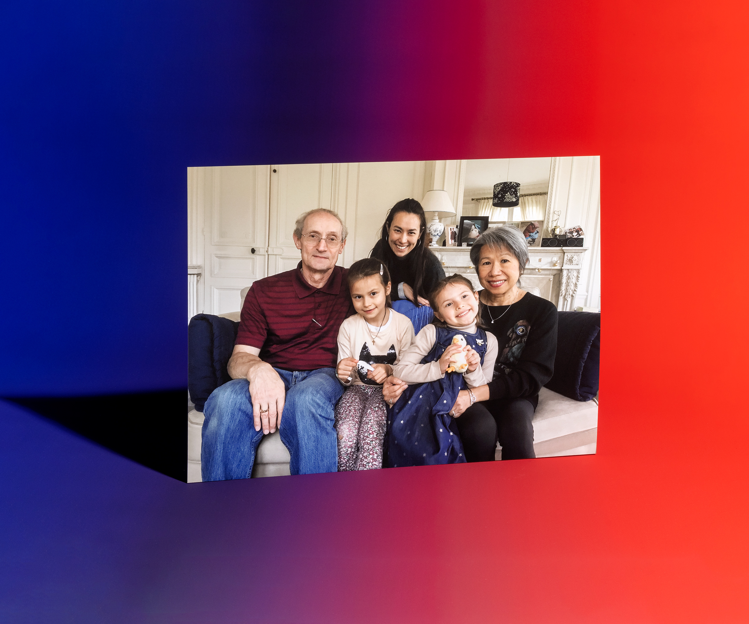 Stacey Pavesi Debré with her parents, Dave and Lonnie Pavesi, and daughters, in Paris in 2017 (Photo-Illustration by Ben Alper for TIME; Photo courtesy Stacey Pavesi Debré)