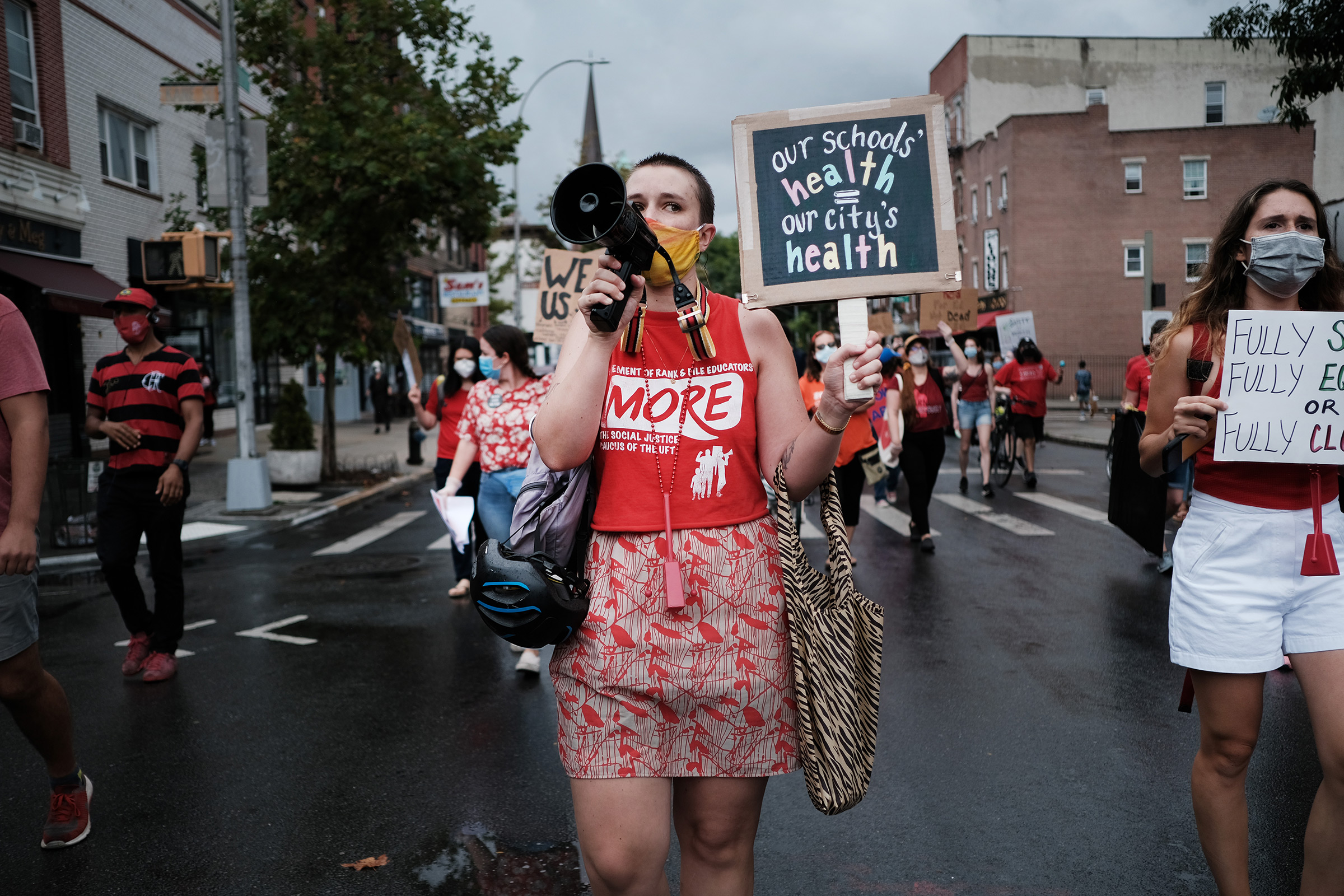 Members of the teachers union, parents and students participate in a march through Brooklyn, N.Y. to demand a safer teaching environment for themselves and for students during the Covid-19 pandemic on Sept. 1, 2020.