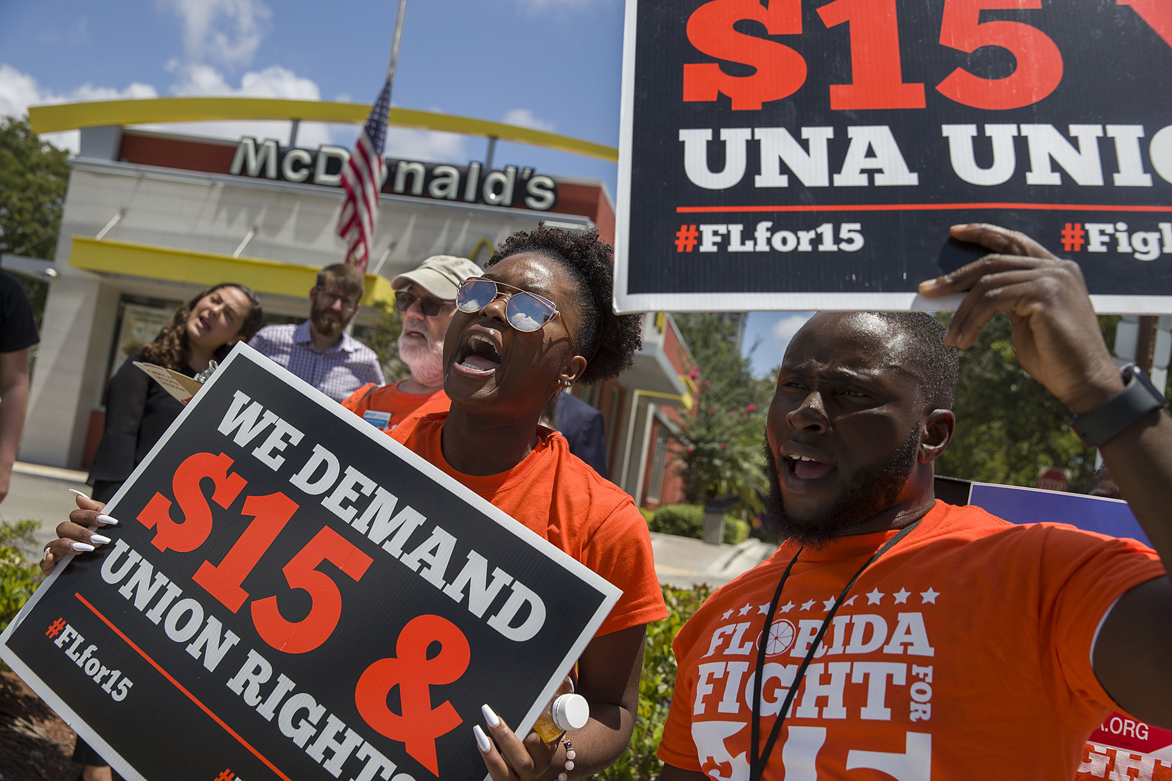People gather together to ask  the McDonald’s corporation to raise workers wages to a $15 minimum wage in Fort Lauderdale, Florida,  on May 23, 2019. (Joe Raedle—Getty Images)