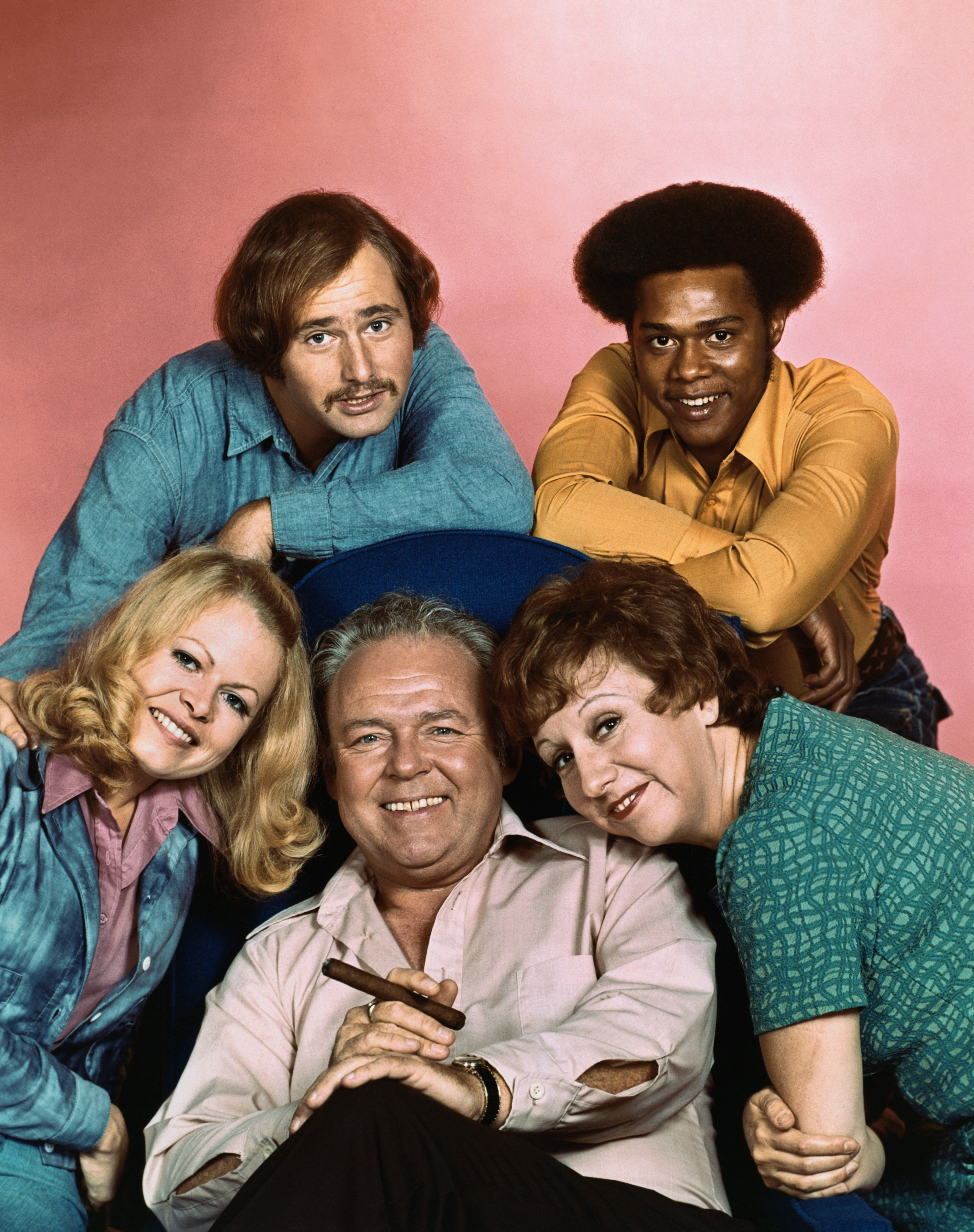 The cast of 'All in the Family': Carroll O'Connor (center), Sally Struthers (left), Rob Reiner (top left), Mike Evans and Jean Stapleton. (Bettmann Archive)