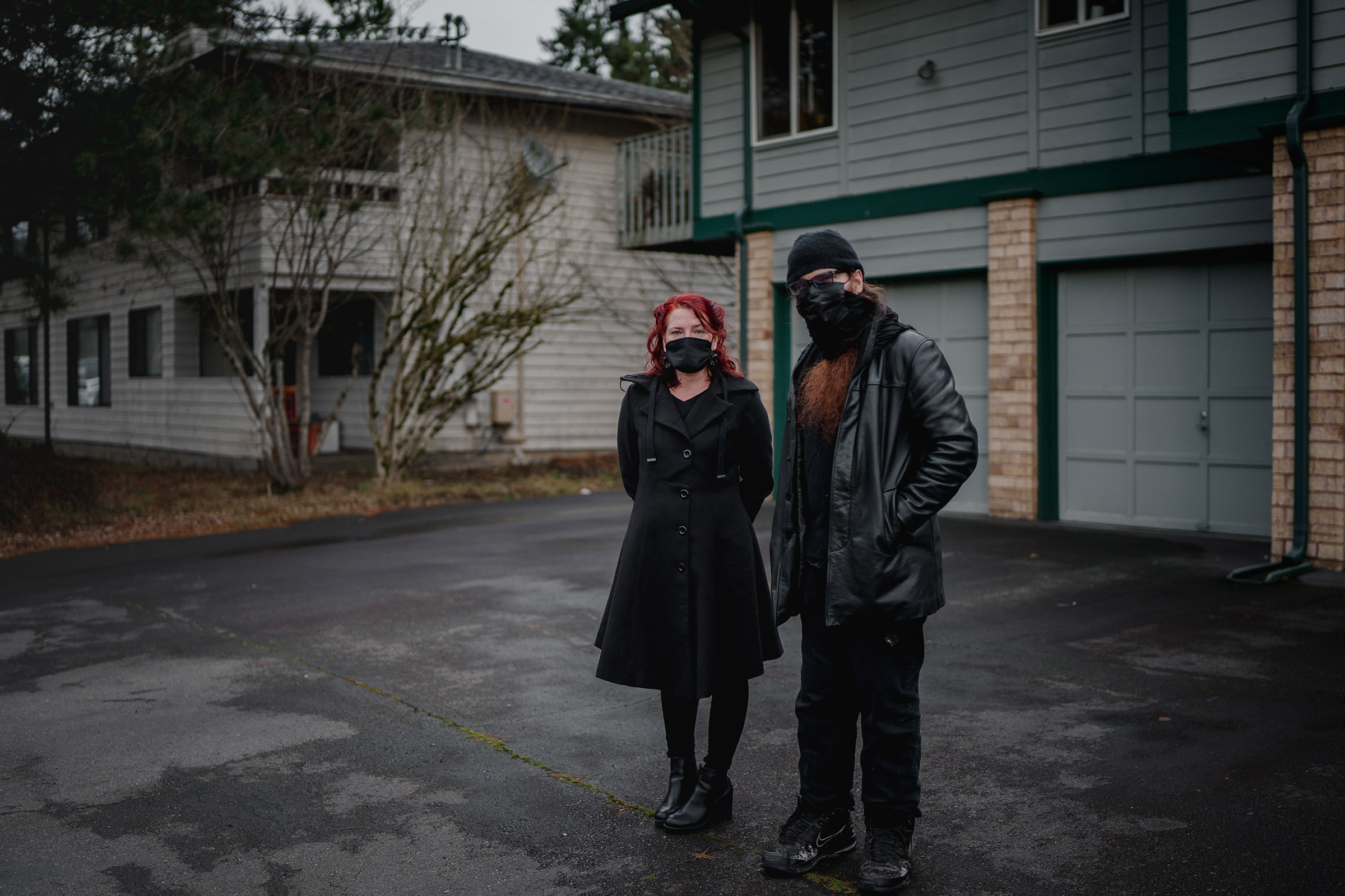 Landlord Rian de Laat, left, and tenant Ollie Aldama, in front of the condo that Aldama rents from de Laat in Seattle. (Jovelle Tamayo for TIME)