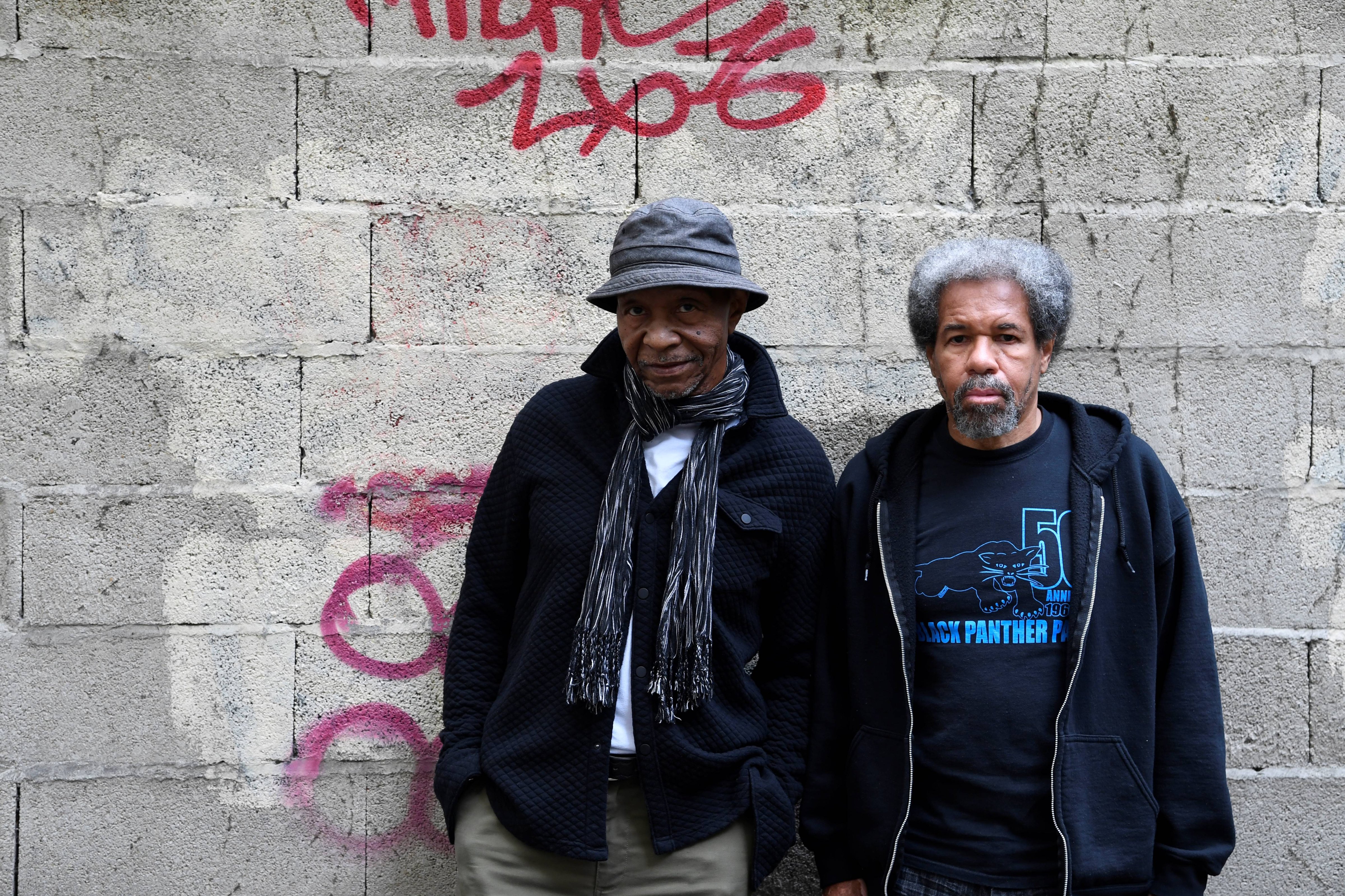 Former Louisiana State Penitentiary prisoners Robert King (R) and Albert Woodfox (L) pose prior to a press conference on Nov. 15, 2016 in Paris. (Alain Jocard—AFP/Getty Images)