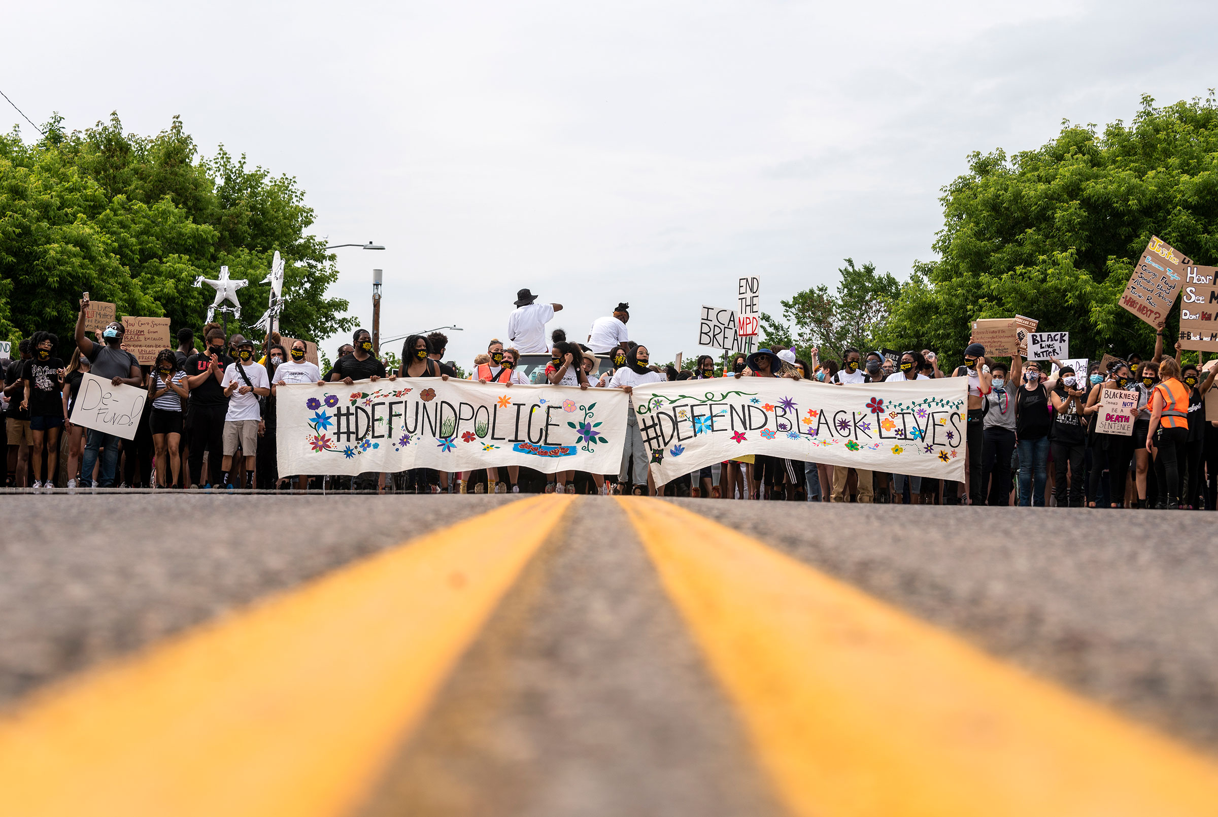 Demonstrators calling to defund the Minneapolis Police Department march in Minneapolis, on June 6, 2020.