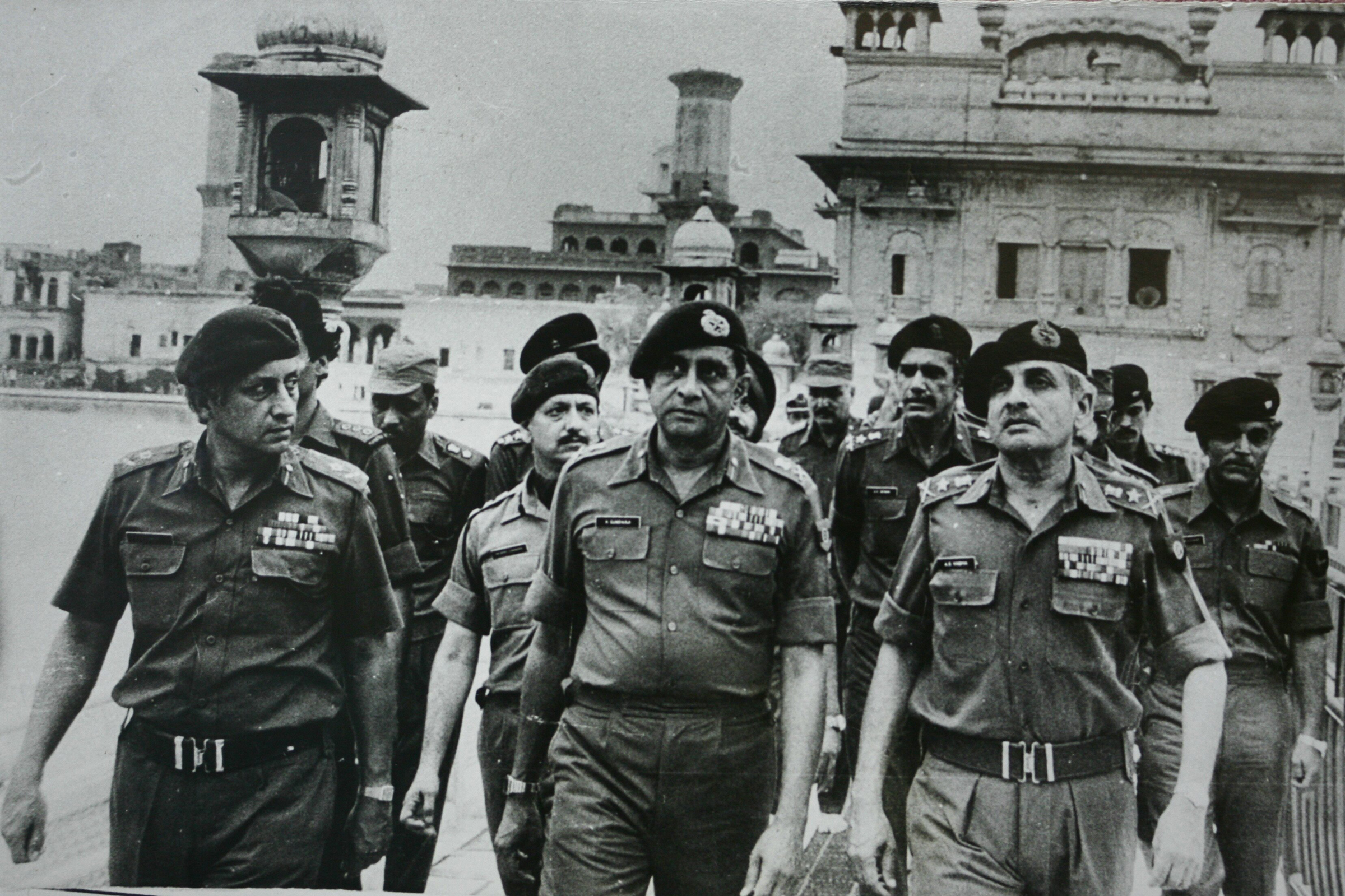Senior army officers at the site of a military operation ordered by Then-Prime Minister Indira Gandhi, to remove Sikh separatists in the Golden Temple in Amritsar, India, in 1984. (The India Today Group/Getty Images)