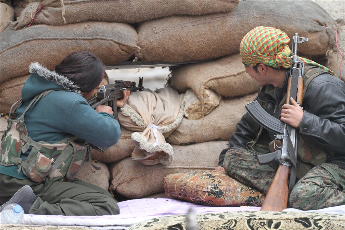 Two fighters defending Kobani during the battle for Kobani, September 2014