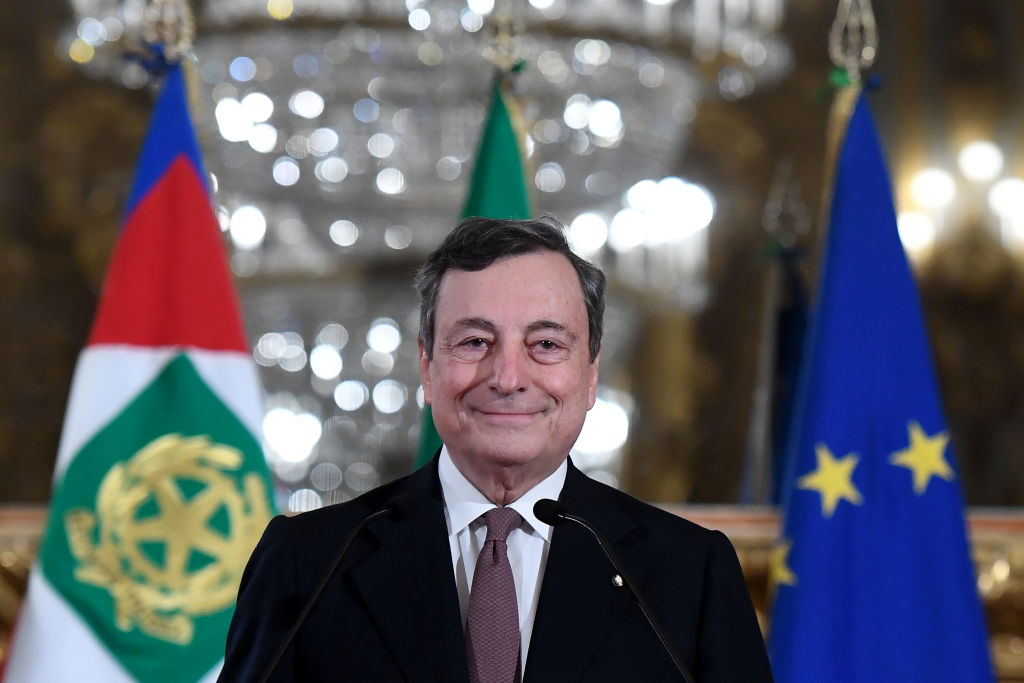 Mario Draghi, Italy's prime minister-designate, smiles at a news conference following a meeting with Italy's President Sergio Mattarella in Rome, Italy, on Friday, Feb. 12, 2021. Draghi agreed to take over as Italys next prime minister, naming his ministers as he prepares to head a new government that will prioritize the pandemic, a struggling economy and moving ahead with European integration. (Alessandro Di Meo/ANSA/Bloomberg)