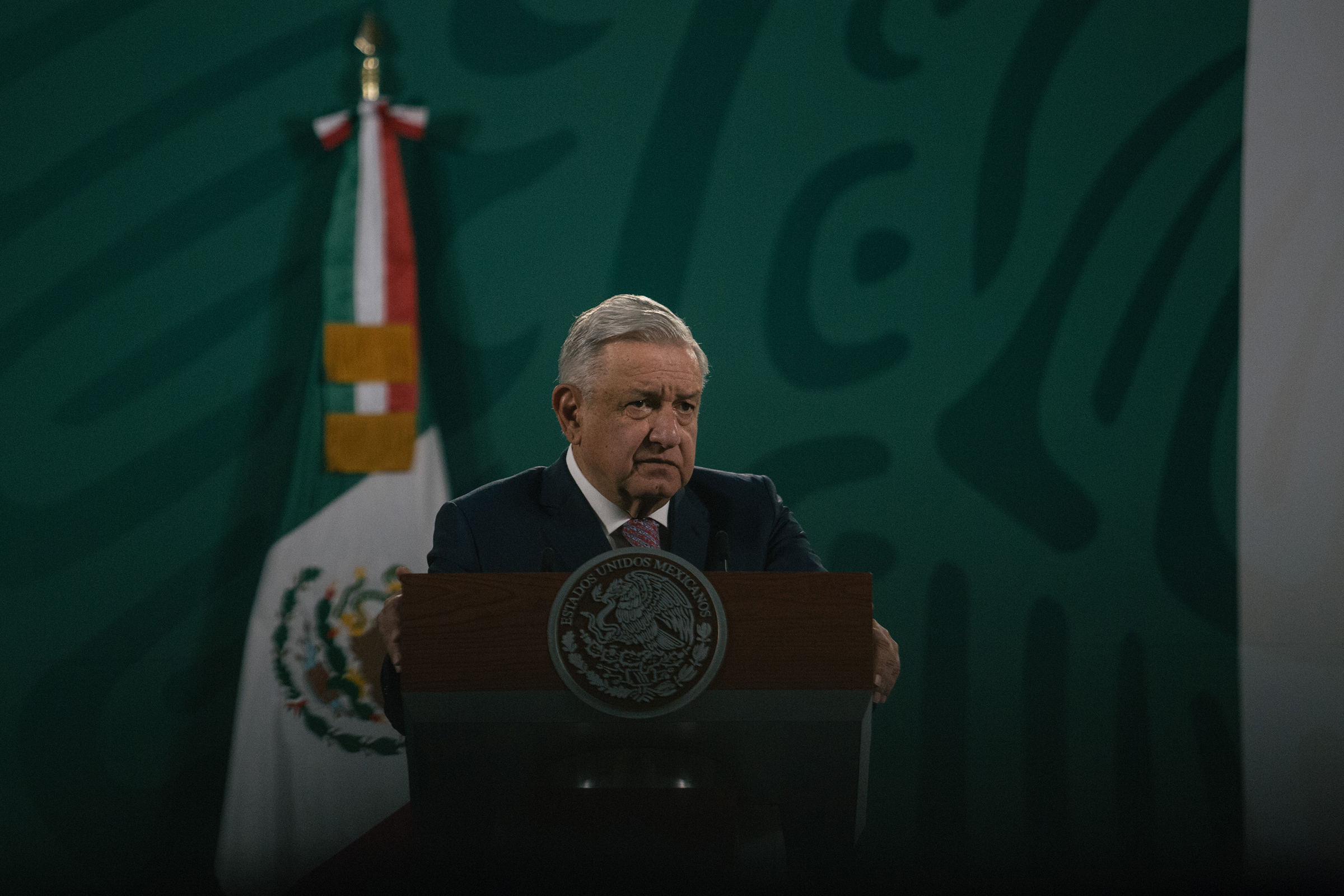 President Andrés Manuel López Obrador speaks during a news conference in Mexico City on Feb. 8. This was his first briefing after announcing he had Covid-19 and began a quarantine. (Luis Antonio Rojas—Bloomberg/Getty Images)