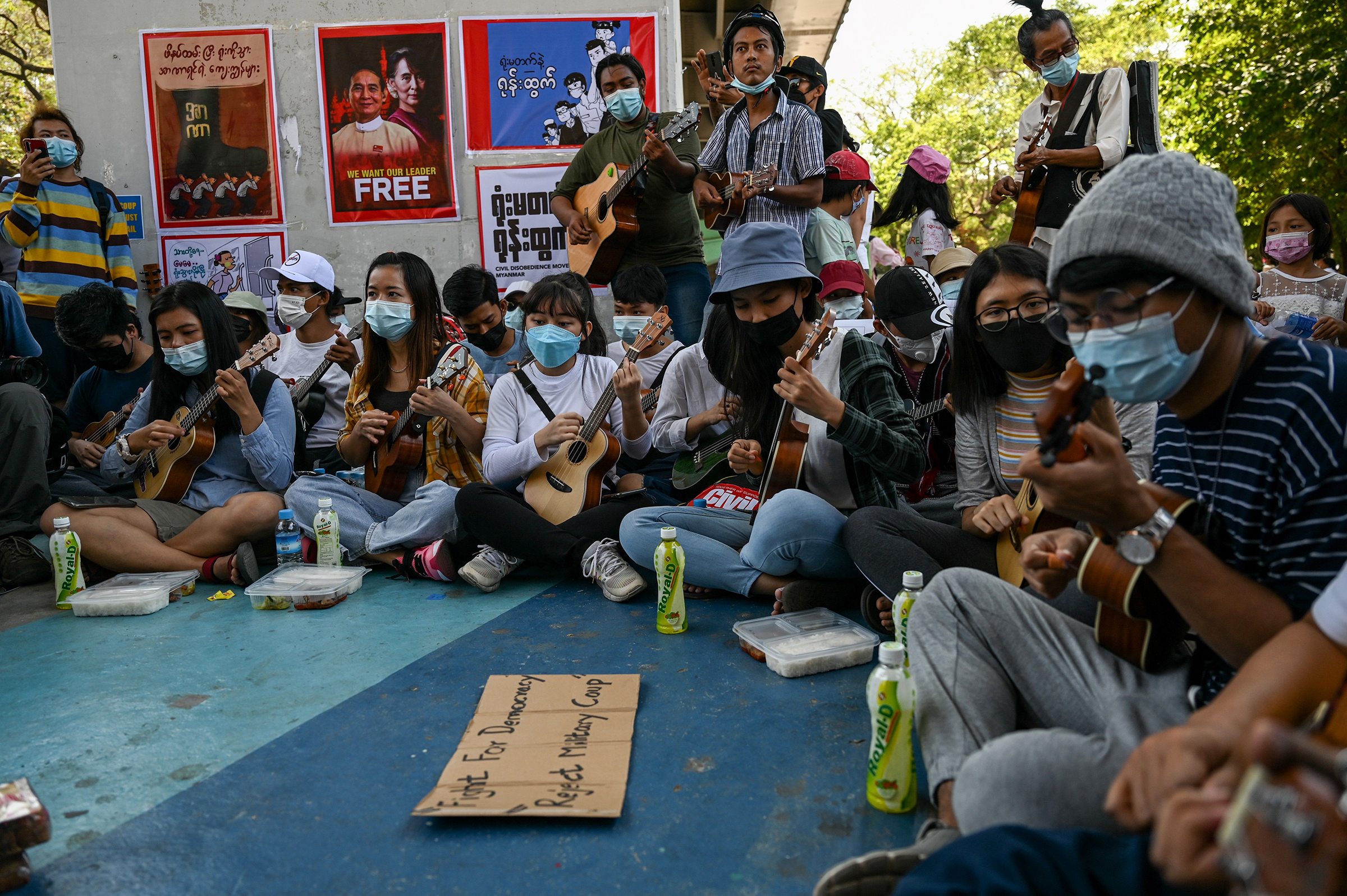 Musicians take part in a demonstration against the military coup in Yangon on Feb. 11 (Ye Aung Thu—AFP/Getty Images)