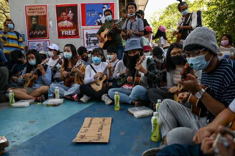 Musicians take part in a demonstration against the military coup in Yangon on Feb. 11