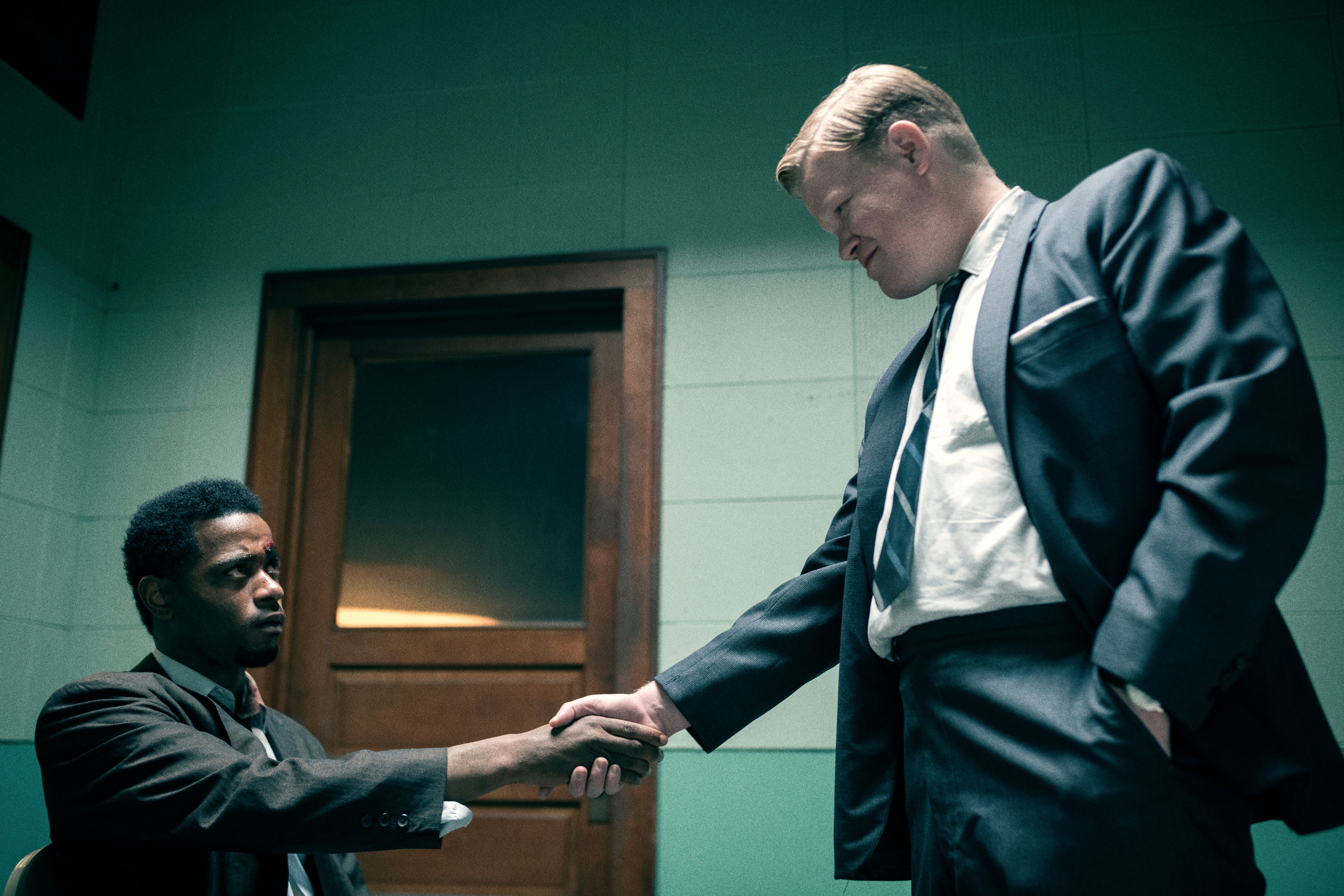 Bill O'Neal (LaKeith Stanfield) and Roy Mitchell (Jesse Plemons) strike a deal (© 2021 Warner Bros. Entertainment Inc. All Rights Reserved)