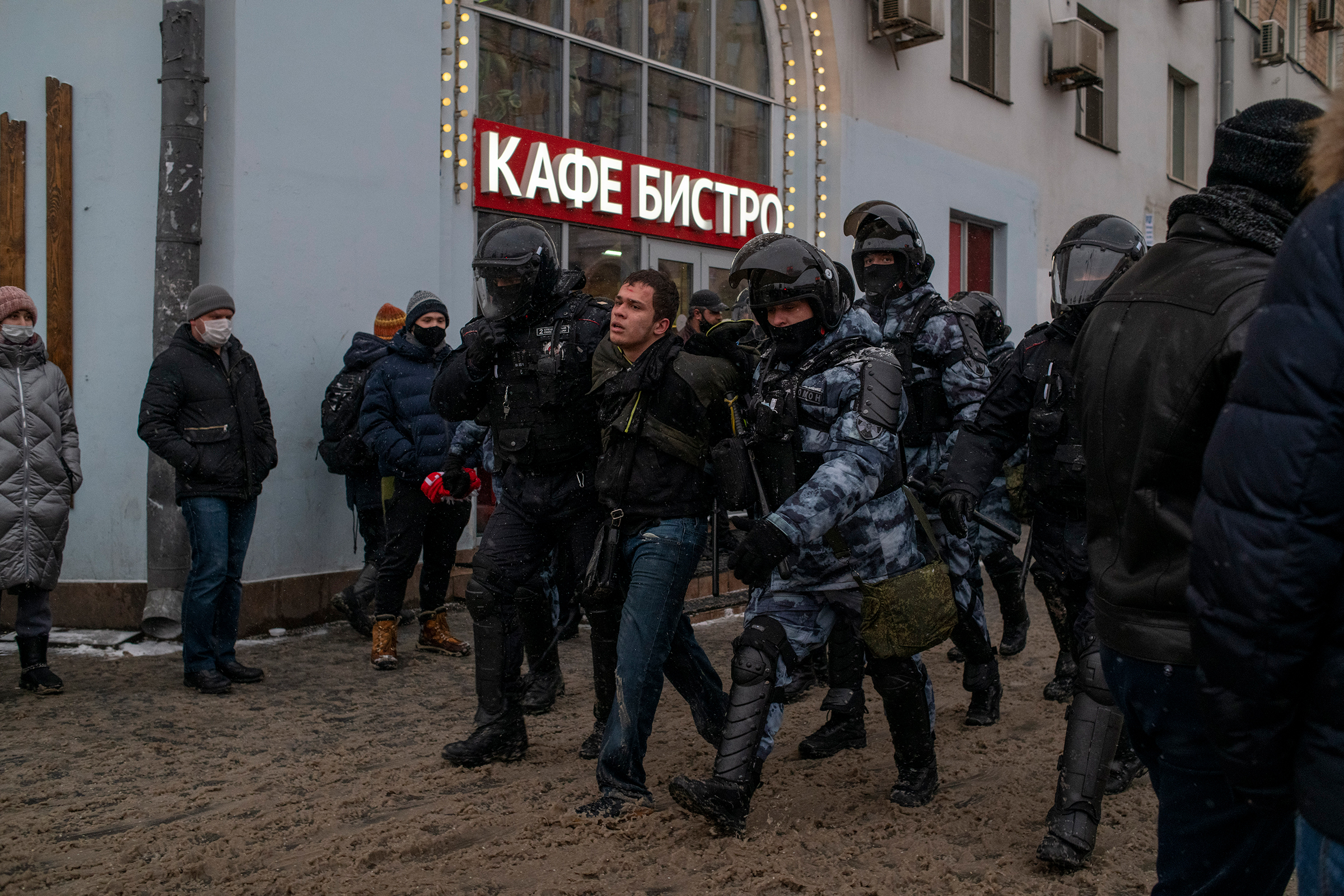 A protester is detained in Moscow on Jan. 31.
