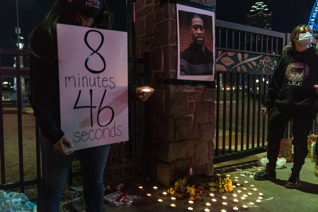 Demonstrators hold a vigil in honor of George Floyd on March 8, 2021 in Atlanta, Georgia. Jury selection was paused today in the trial of former Minneapolis police officer Derek Chauvin, who is charged in Floyd's death. (Megan Varner-Getty Images)