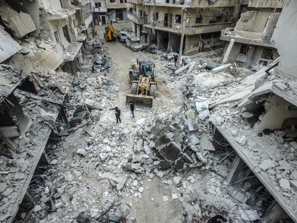 A drone photo shows collapsed and damaged buildings after Russian warplanes hit residential areas including a hospital and a bakery in Ariha district, south of Idlib, Syria on January 30, 2020. (Izzeddin Idilbi—Anadolu Agency/Getty Images)