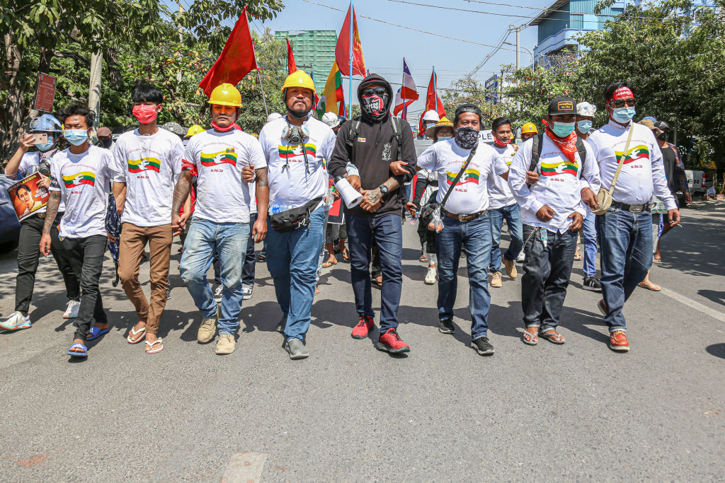 Protesters from all Burma Federation of Youth unions march ahead of other protesters during the military coup protest in Mandalay on Feb. 24, 2021. (Kaung Zaw Hein/SOPA Images/LightRocket via Getty Images)
