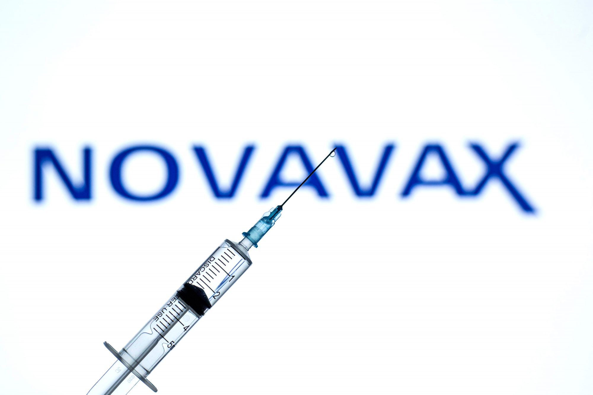 In this photo illustration a medical syringe seen displayed