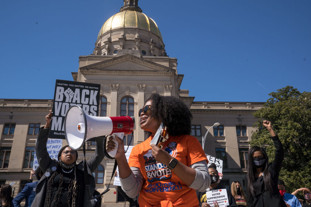 Demonstrators protest outside of the Capitol building in opposition of House Bill 531 in Atlanta, Georgia, on March 8, 2021. (Megan Varner/Getty Images)