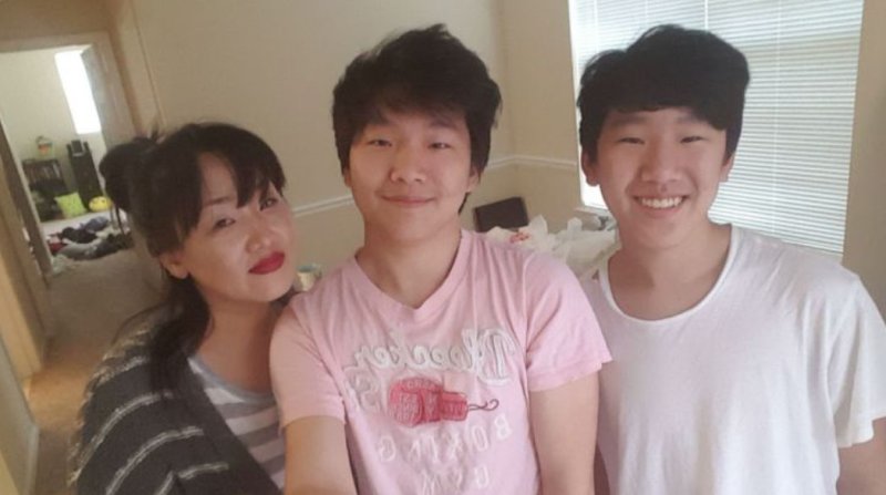 Hyun Jung Grant with her two sons
