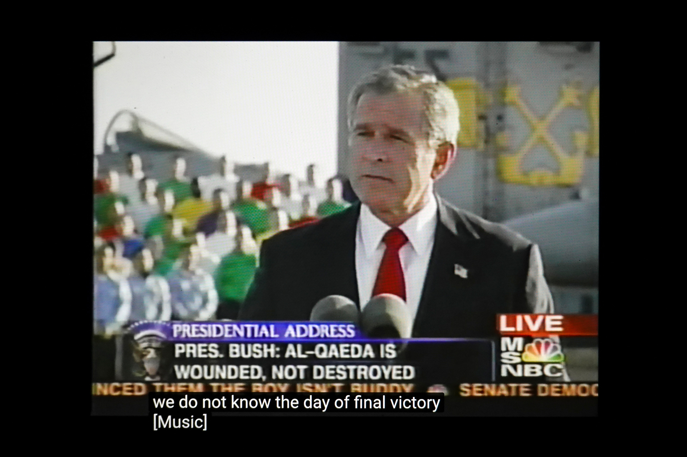 President George W. Bush announc- es “Mission Accomplished” regard- ing the war in Iraq on the aircraft carrier U.S.S. Abraham Lincoln on May 1, 2003. The vast majority of casualties and violence occurred af- ter the speech.