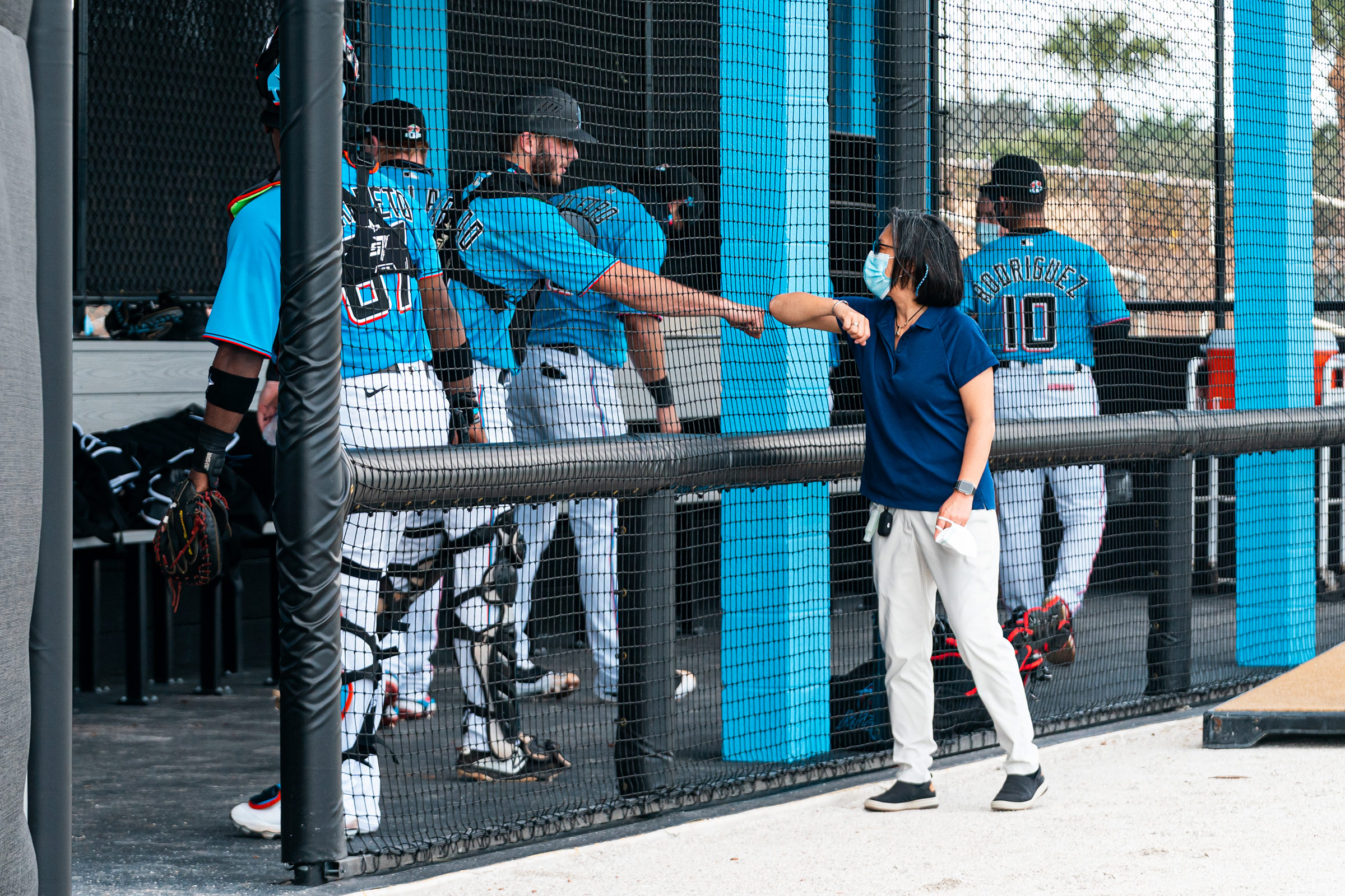 Ng greets Miami Marlins prospect Cameron Barstad on Feb. 18, the opening day of spring training, in Jupiter, Fla. (Miami Marlins)