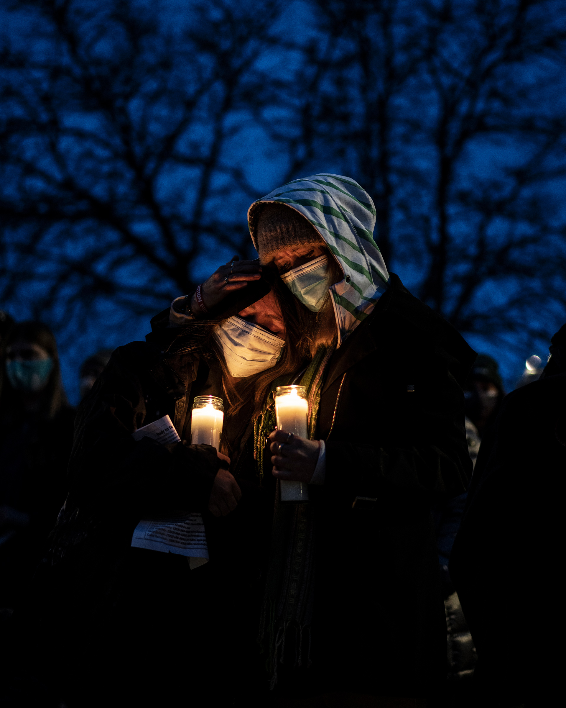 Mourners attend a vigil to commemorate the victims of a mass shooting at a King Soopers grocery store in Boulder, C., on March 25, 2021. (Chet Strange—Getty Images)