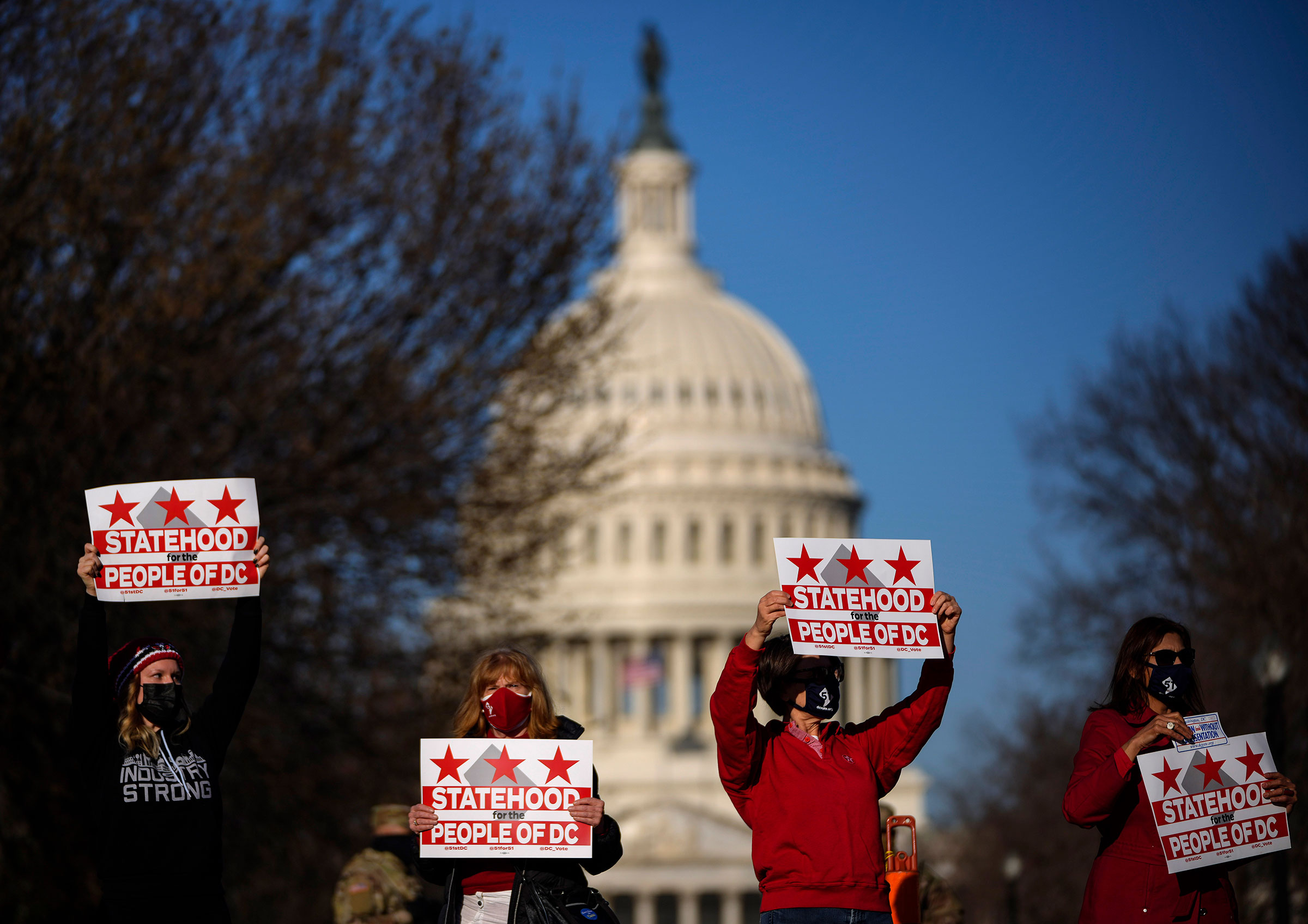 Residents of D.C. rally for statehood near the Capitol in Washington on March 22, 2021. (Drew Angerer—Getty Images)
