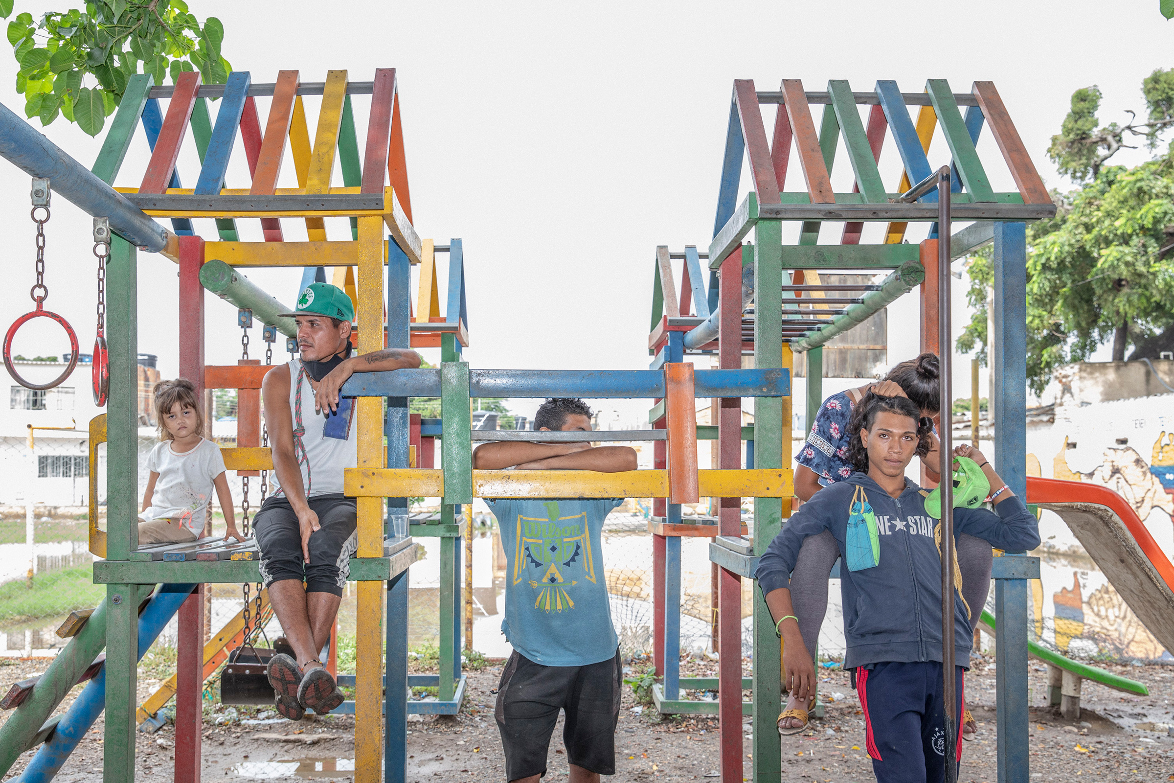 A group of Venezuelans at a playground in a park on the border. (Fabiola Ferrero—Magnum Foundation for TIME)