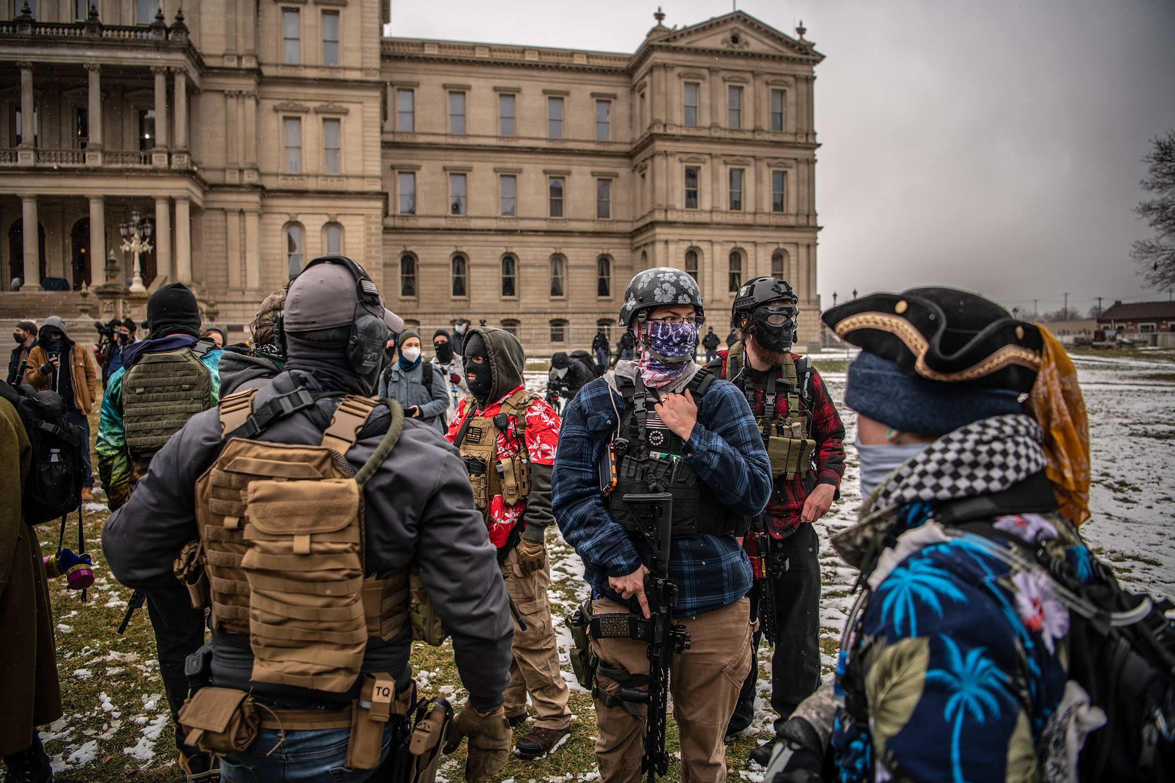 Members of the Boogaloo movement gather outside the Michigan state capitol in Lansing on Jan. 17 (Bryan Denton—The New York Times/Redux)