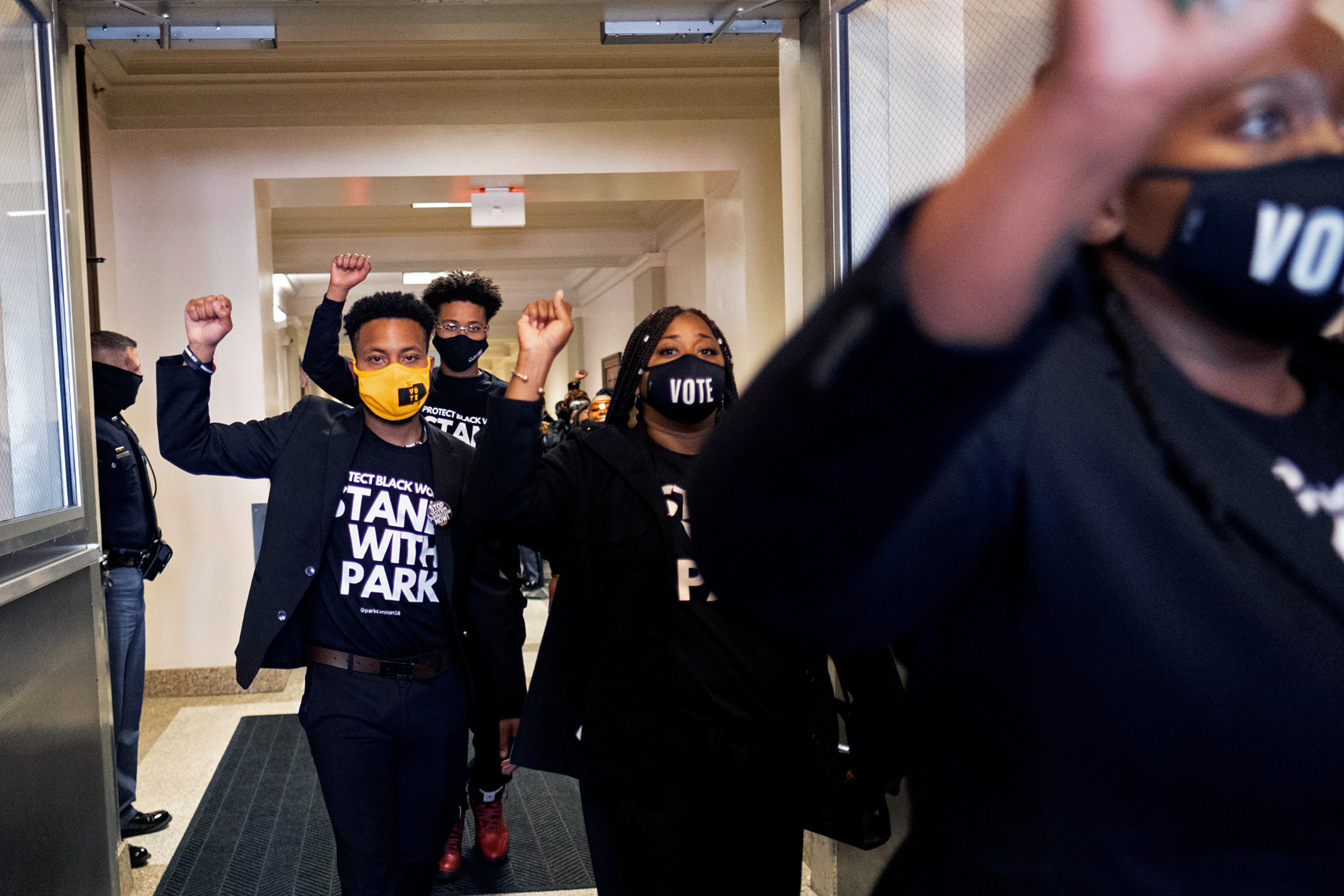 Supporters of Georgia State Rep. Park Cannon leave the State Capitol in Atlanta on Monday morning, March 29, 2021 after escorting her into the building. (Ben Gray—AP)