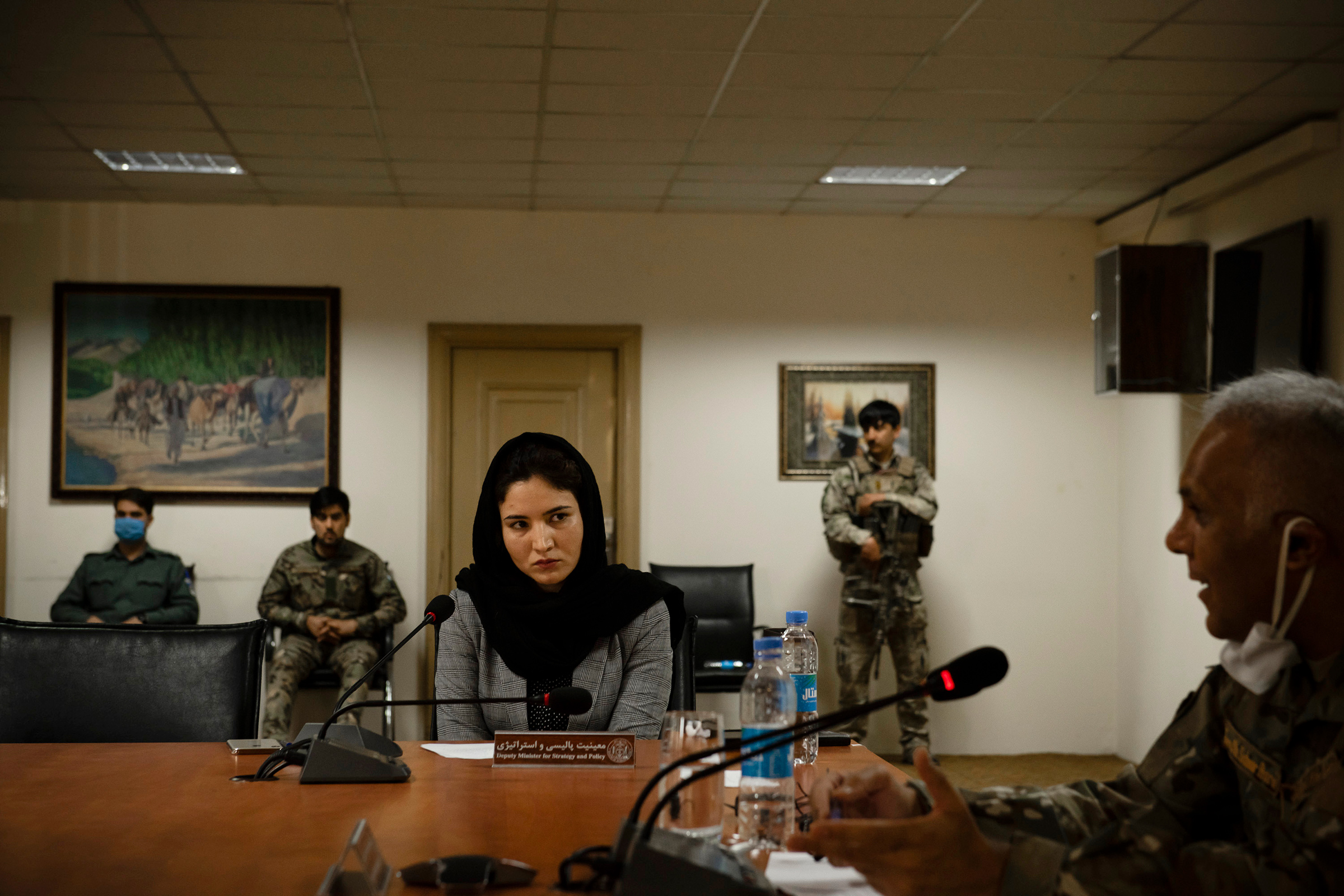 Hosna Jalil, then deputy minister of the interior, at a government meeting where only one other woman, Kabul's deputy governor, was present, in Kabul on June 20, 2020. (Kiana Hayeri—The New York Times/Redux)
