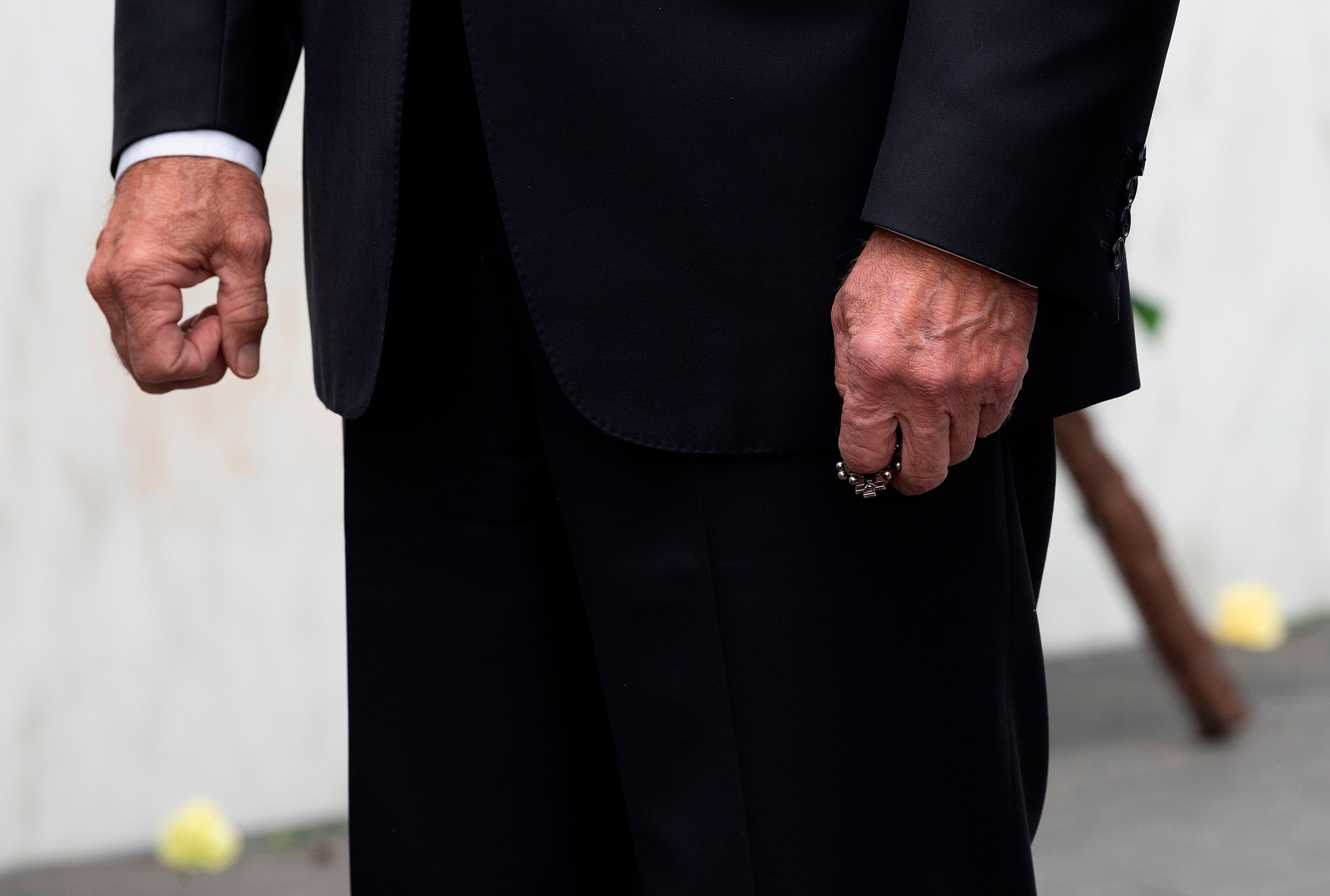 Biden clutches a rosary after laying a wreath on Sept. 11, 2020, at the Flight 93 National Memorial, near Shanksville, Pa. (Jim Watson—AFP/Getty Images)