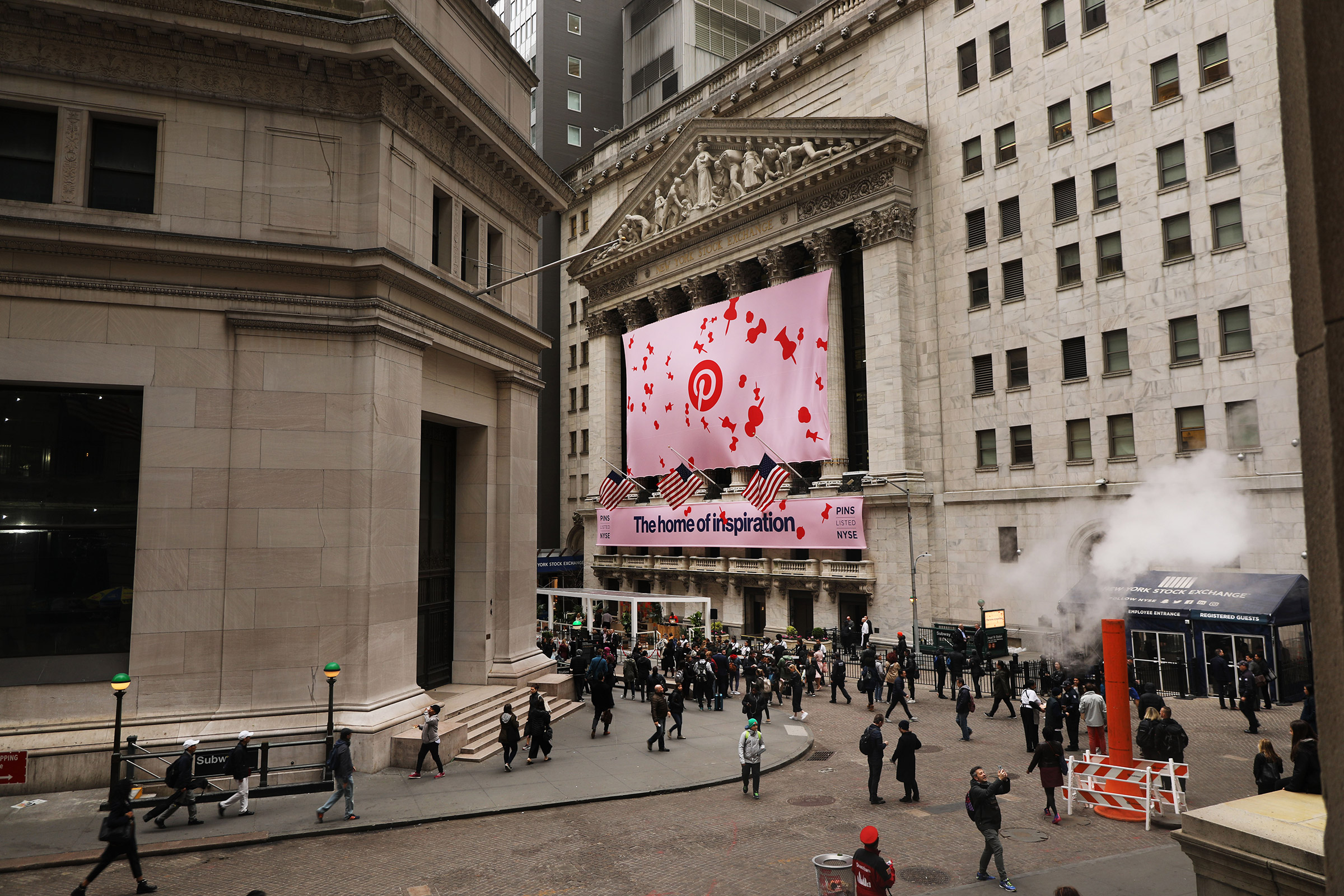 A Pinterest Inc. banner hangs from the New York Stock Exchange on the morning that Pinterest Inc. makes its initial public offering in New York City, on April 18, 2019. (Spencer Platt—Getty Images)