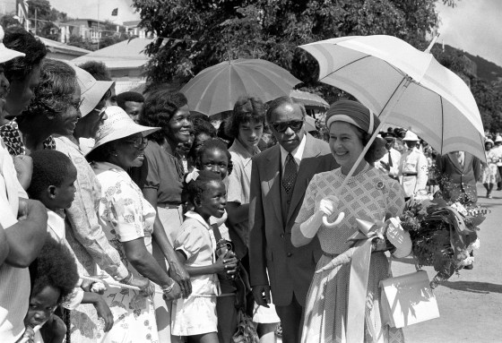 Queen Elizabeth II pauses for a word with local inhabitants in Tortola when she and the Duke of Edinburgh visited the British Virgin Islands as part of the Silver Jubilee tour of the West Indies, Oct. 1977