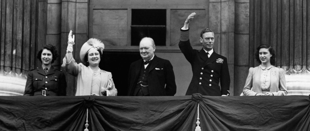 Prime Minister Winston Churchill appears on the balcony at Buckingham Palace with King George VI, Queen Elizabeth and the two princesses on the afternoon of V-E Day, May 8, 1945.