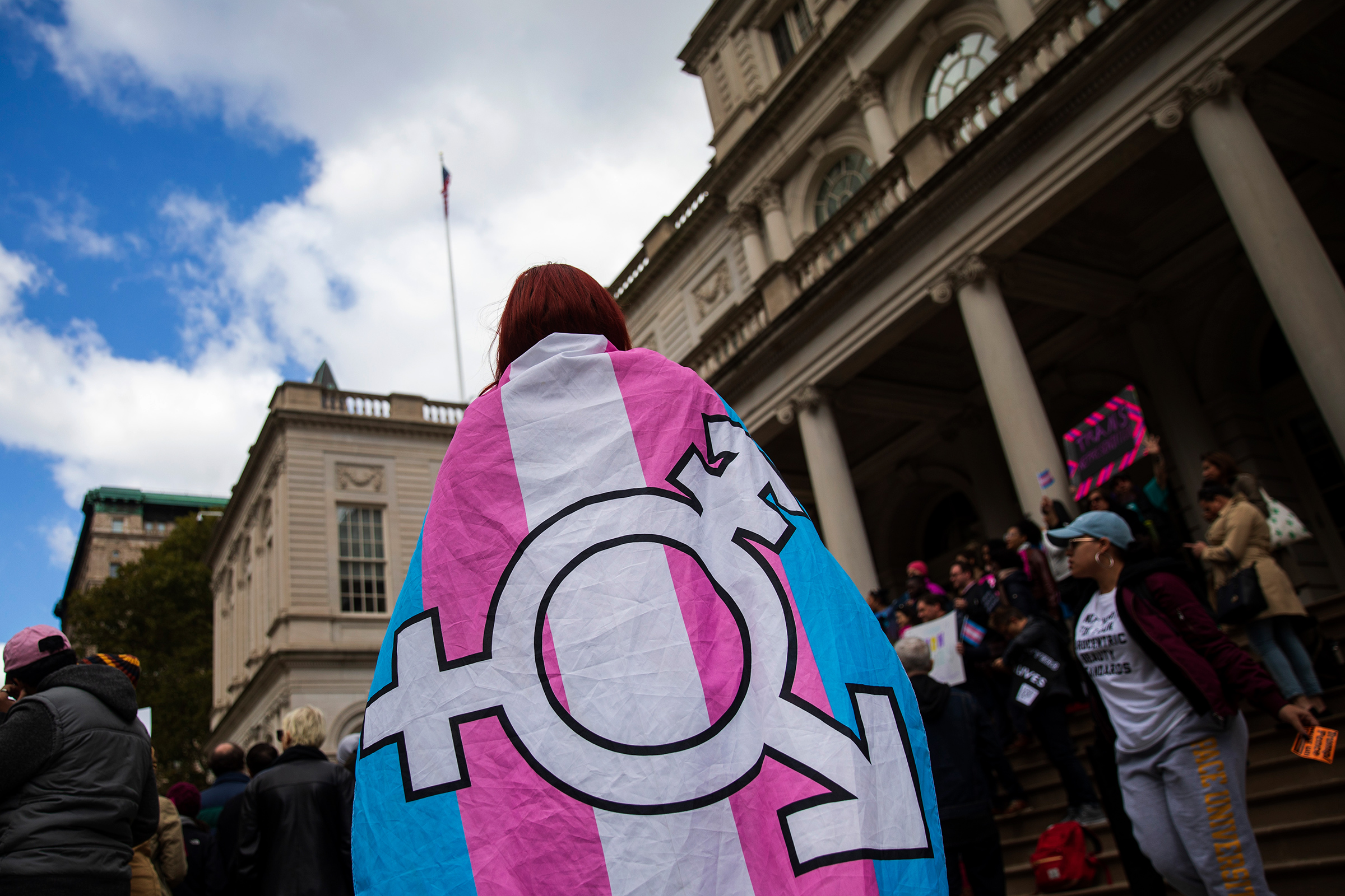 Activists and their supporters rally in support of transgender people on the steps of New York City Hall, October 24, 2018 in New York City. (Drew Angerer—Getty Images)