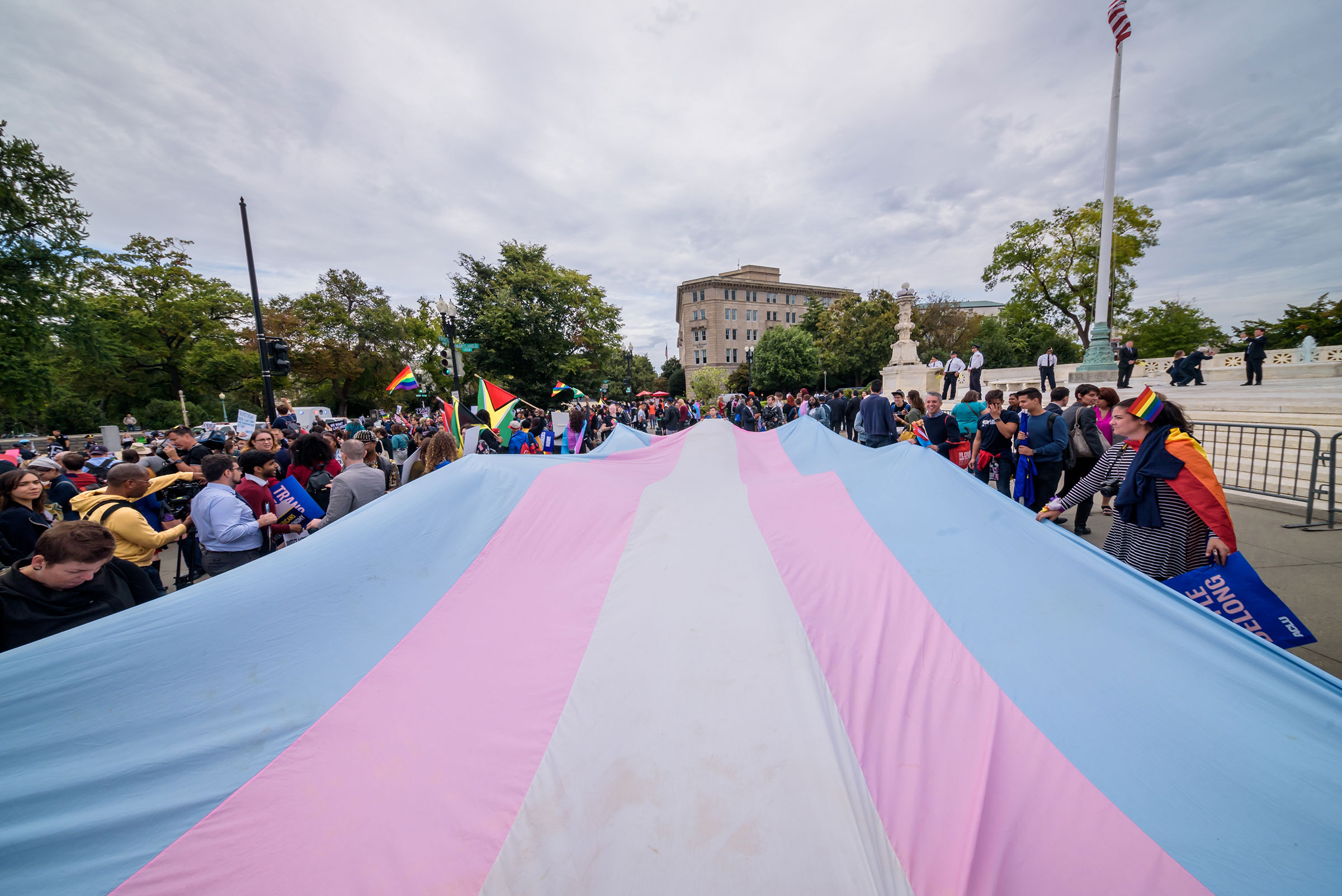 A large Trans Pride flag unfurled outside the Supreme Court in Washington on Oct. 8, 2019. (Erik McGregor—LightRocket/Getty Images)