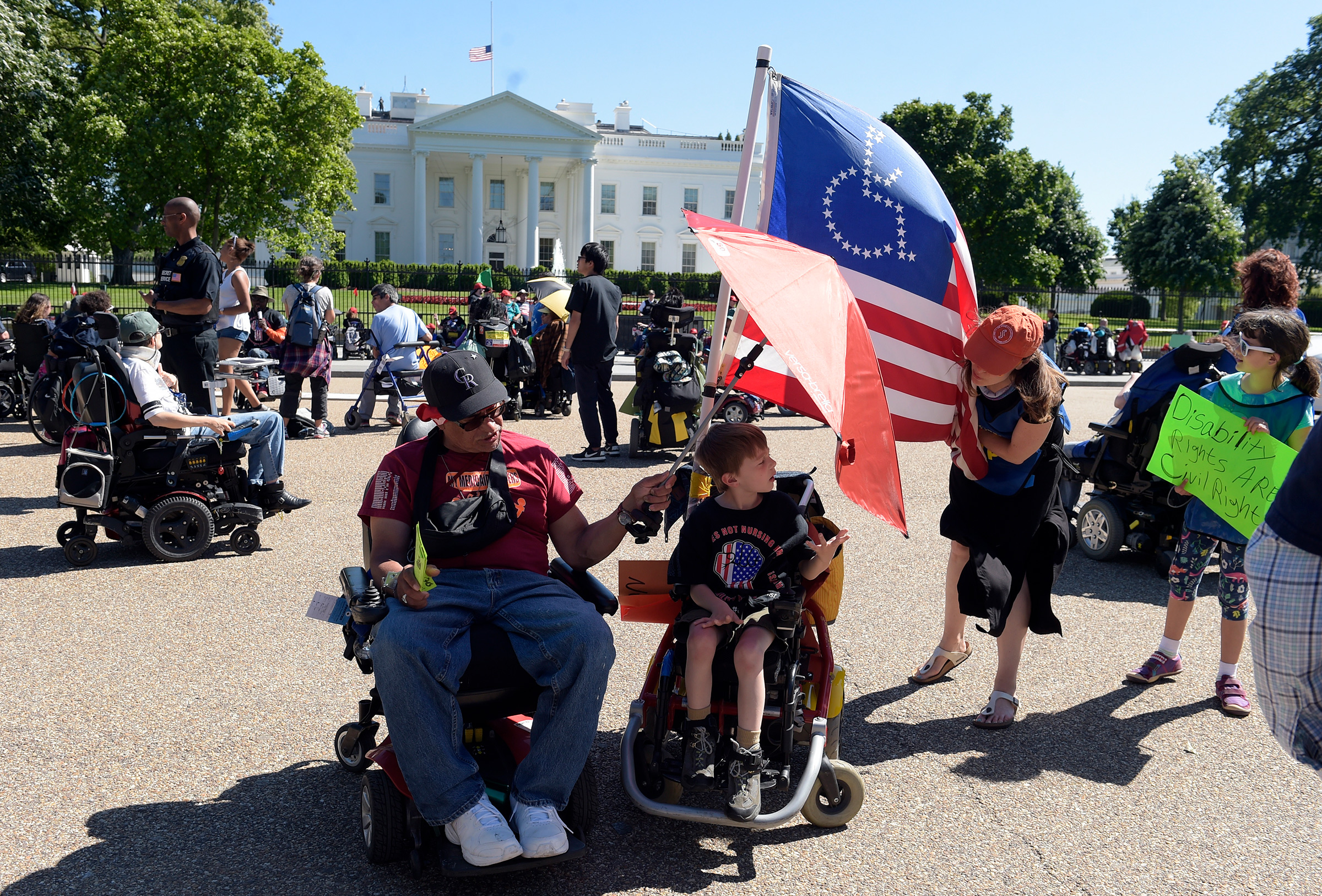 Protesters supporting people with disabilities gather outside the White House in Washington, May 15, 2017 (Susan Walsh—AP)