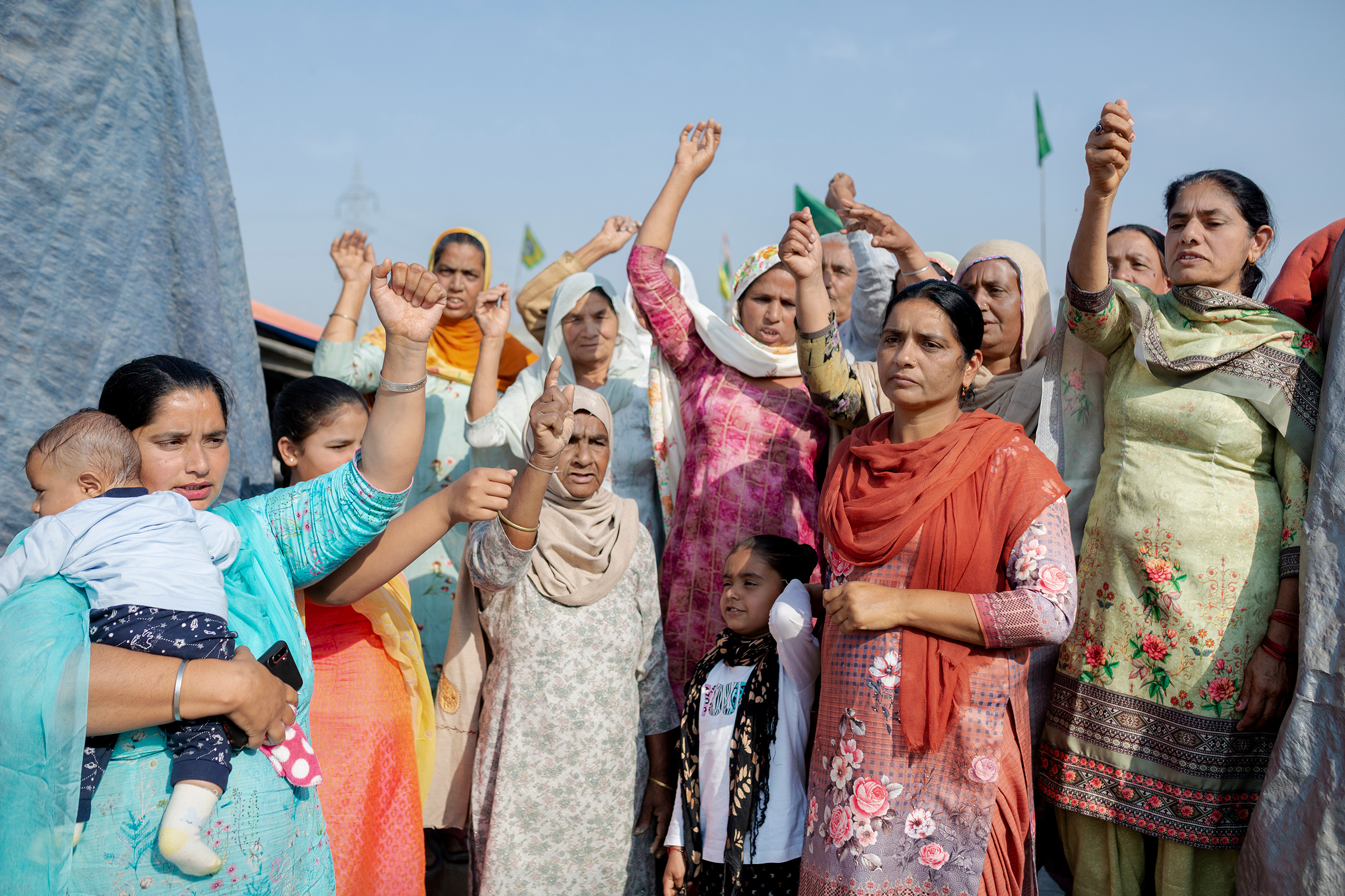 Kiranjit Kaur, far left, came to the Tikri protest site from Talwandi, Punjab, on Feb. 23 with a group of 20 women, including her mother-in-law and children. “It is important for all women to come here and mark their presence in this movement. I have two daughters, and I want them to grow up into the strong women they see here.” (Kanishka Sonthalia for TIME)