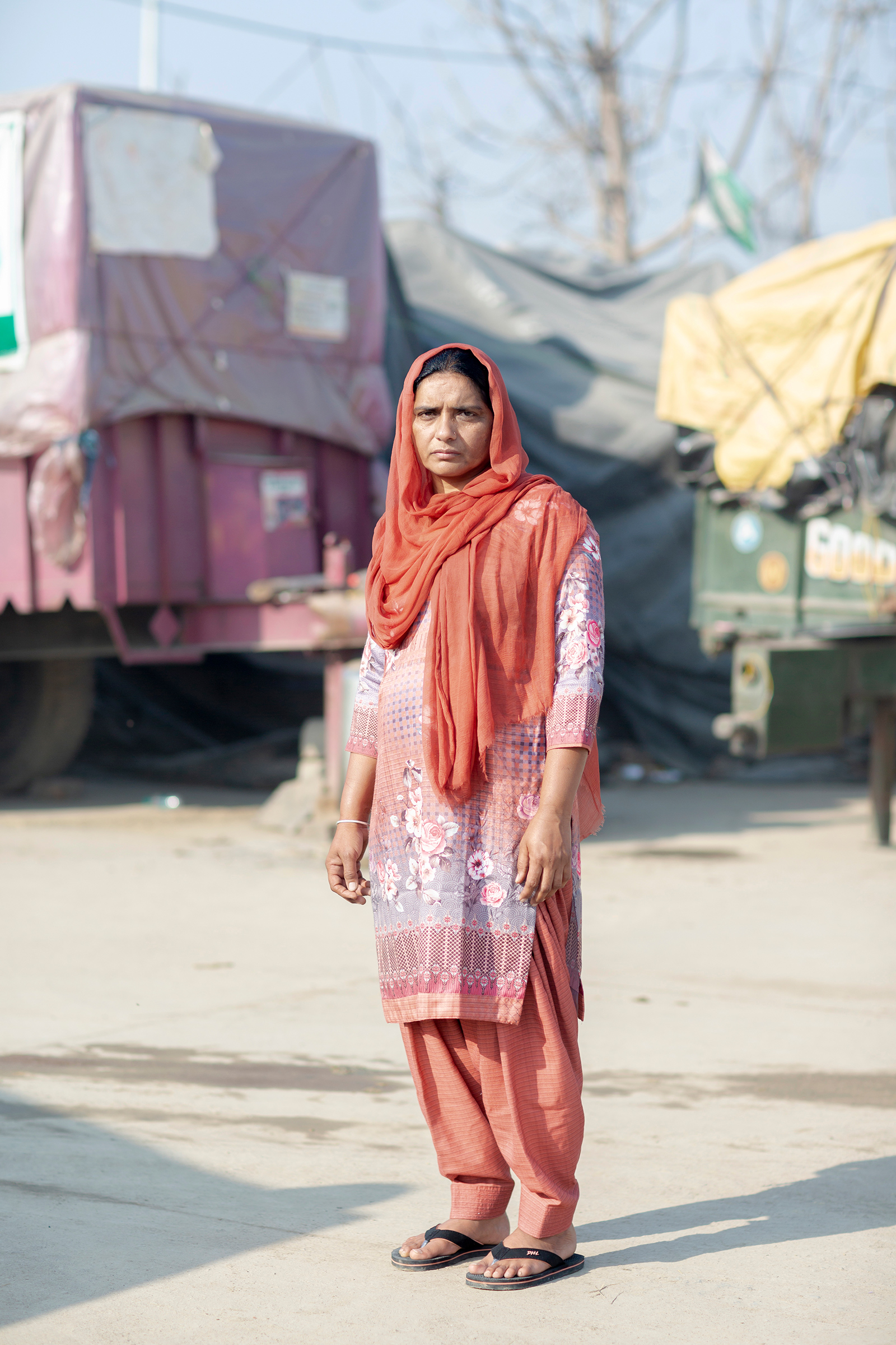 Amandeep Kaur, 41, from Talwandi, Punjab, is employed as a community health worker and as a farmer to support her two daughters. Her husband died by suicide five years ago; because she did not know her rights, she didn’t receive government compensation given to families of farmers who die by suicide. The new laws, she says, “will kill us, will destroy what little we have.” (Kanishka Sonthalia for TIME)