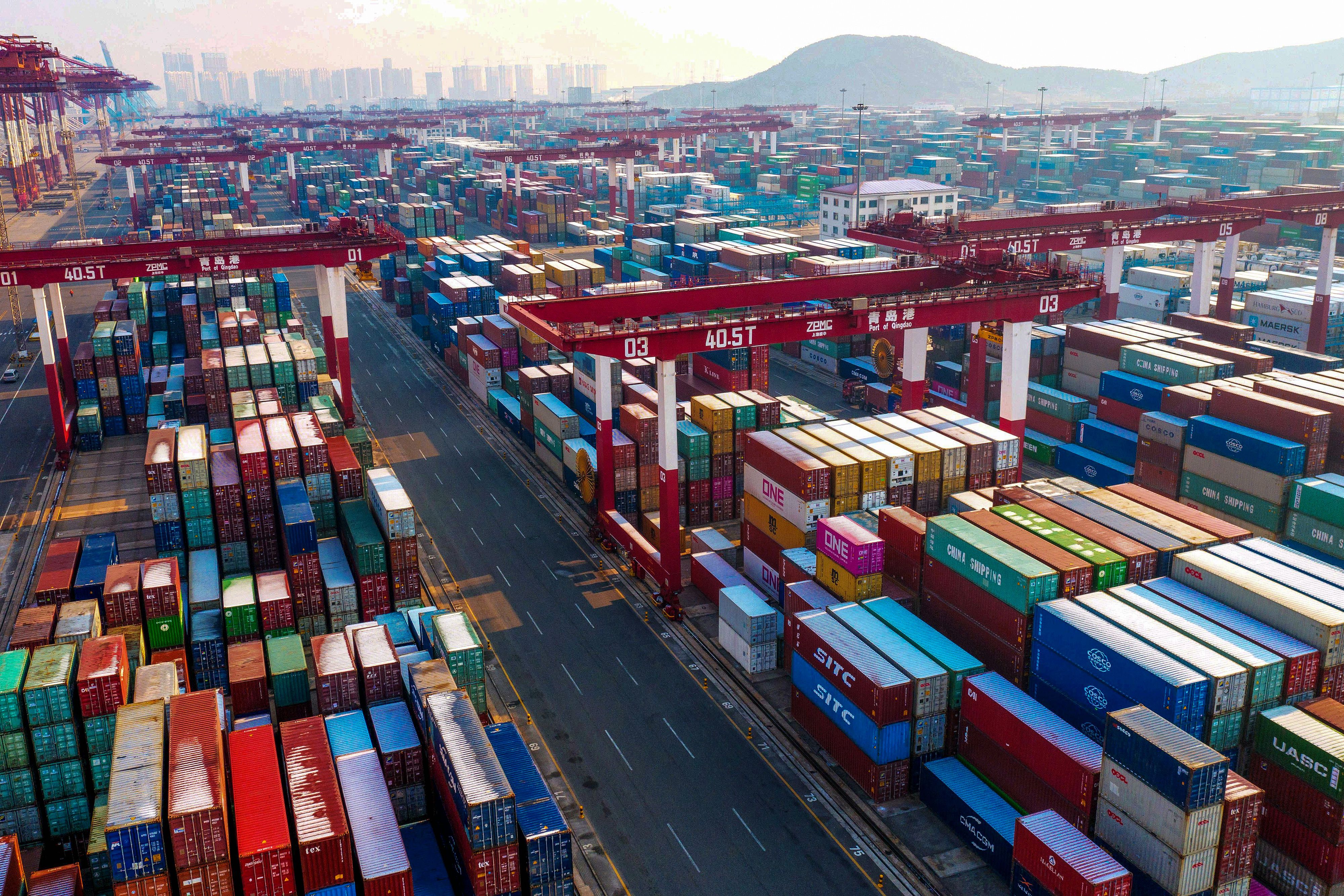 Containers are seen stacked at a port in Qingdao in China's eastern Shandong province on January 14, 2020. China's trade surplus with the United States narrowed in 2019 as the world's two biggest economies exchanged punitive tariffs in a bruising trade war (STR/AFP via Getty Images)