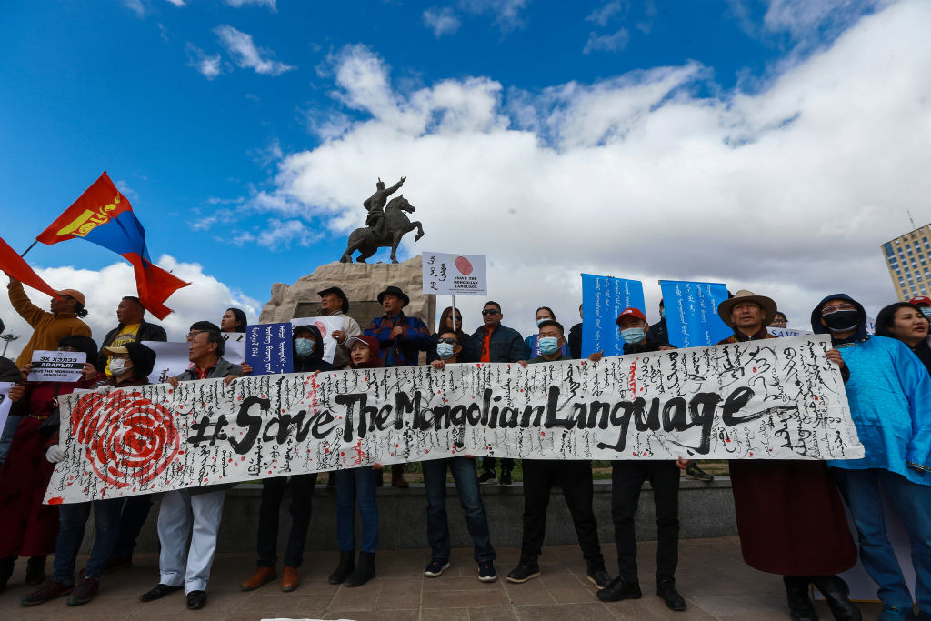 Mongolians protest against China's plan to introduce Mandarin-only classes at schools in the Chinese province of Inner Mongolia, at Sukhbaatar Square in Ulaanbaatar, the capital of Mongolia on September 15, 2020. - (BYAMBASUREN BYAMBA-OCHIR/AFP via Getty Images)