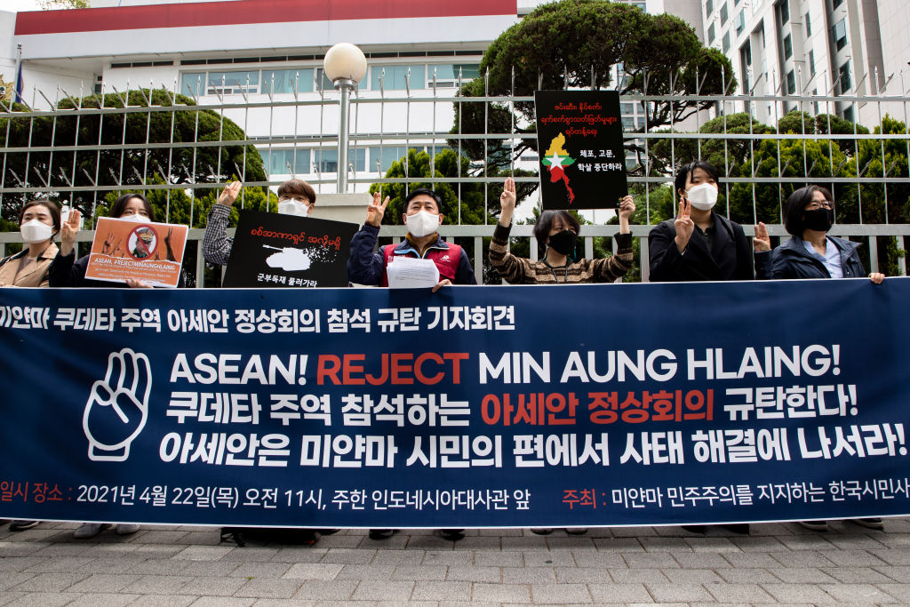 Members of the Korean Civil Society Association, which supports Myanmar democracy, hold an emergency press conference in front of the Indonesian Embassy in Korea and condemn the attendance of the Southeast Asian Nations Association (ASEAN) summit of the chief commander of Myanmar's military regime, Min Aung Hlaing, on April 22, 2021 in Seoul, South Korea (Chris Jung/NurPhoto via Getty Images)